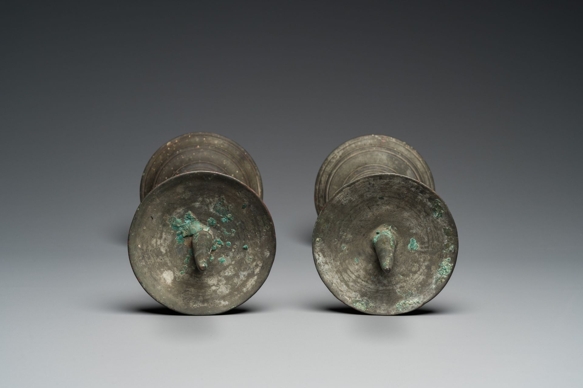 A pair of patinated bronze pricket candlesticks, France, 17th C. - Image 6 of 7