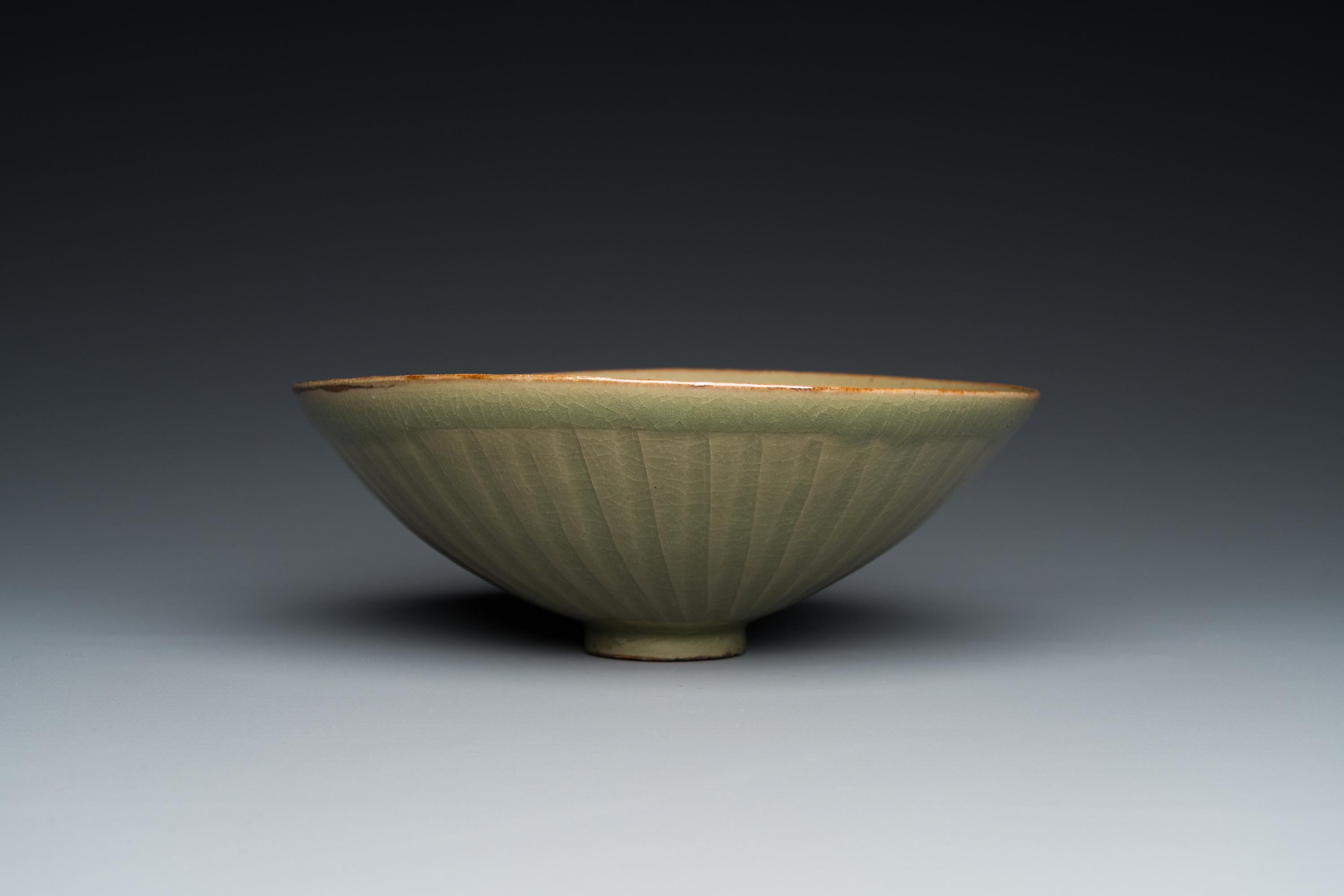 A Chinese Yaozhou celadon bowl with underglaze floral design, probably Song - Image 5 of 7