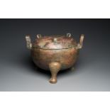 A very large archaic bronze tripod vessel and cover, 'ding', Eastern Zhou period