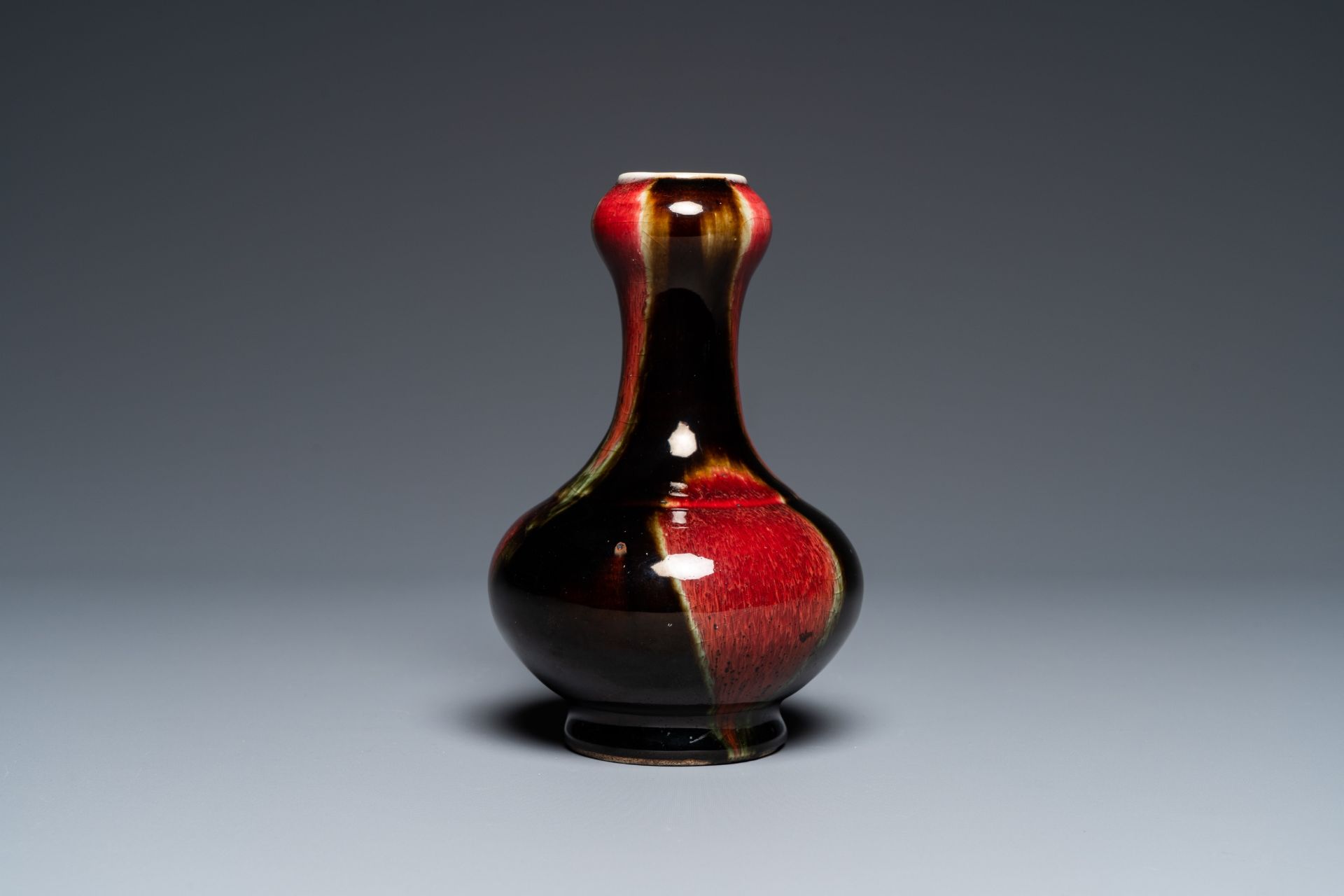 A Chinese flambŽ-glazed garlic head vase, 19th C.
