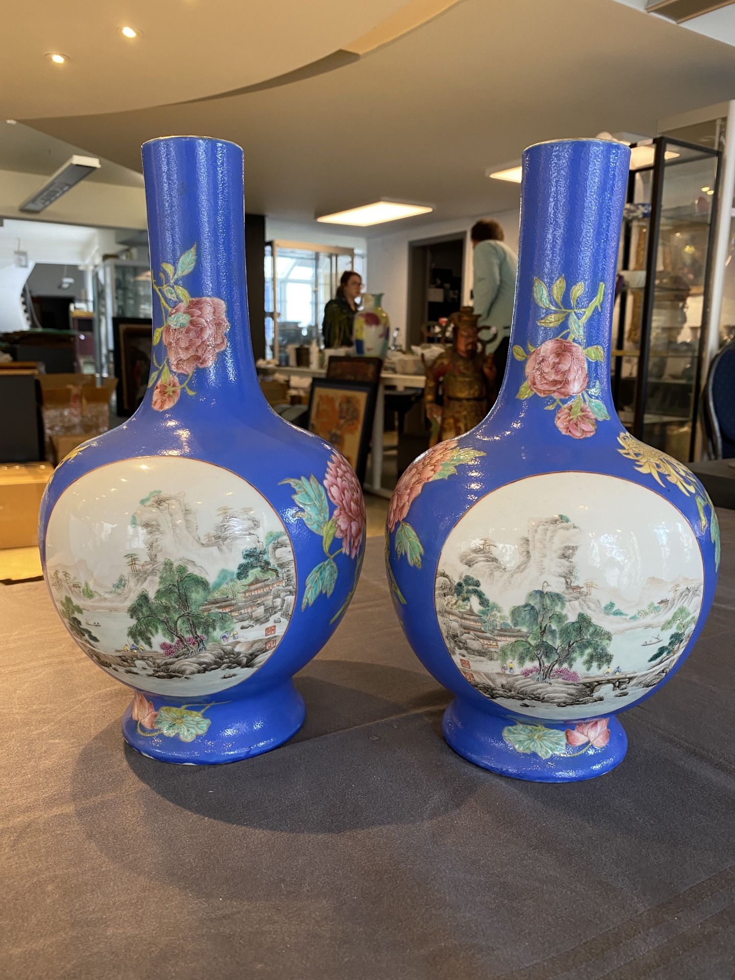 A pair of Chinese blue-ground famille rose vases, He Xuren ___ seal mark, 20th C. - Image 8 of 28