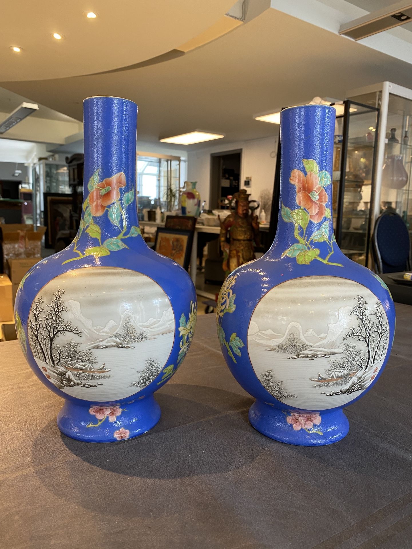 A pair of Chinese blue-ground famille rose vases, He Xuren ___ seal mark, 20th C. - Image 6 of 28