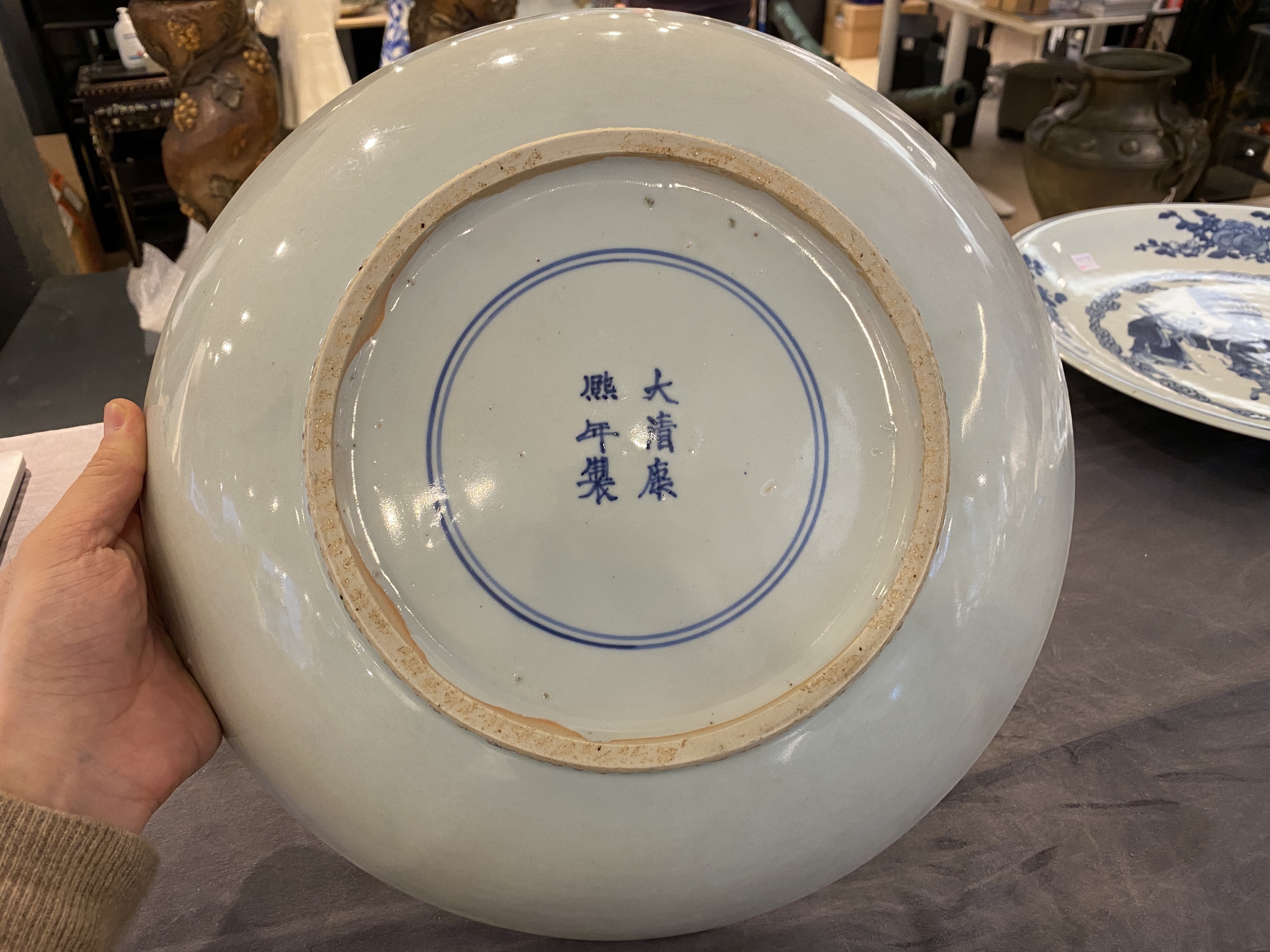 A large Chinese blue and white 'lady and boy' dish, Kangxi mark and of the period - Image 8 of 13