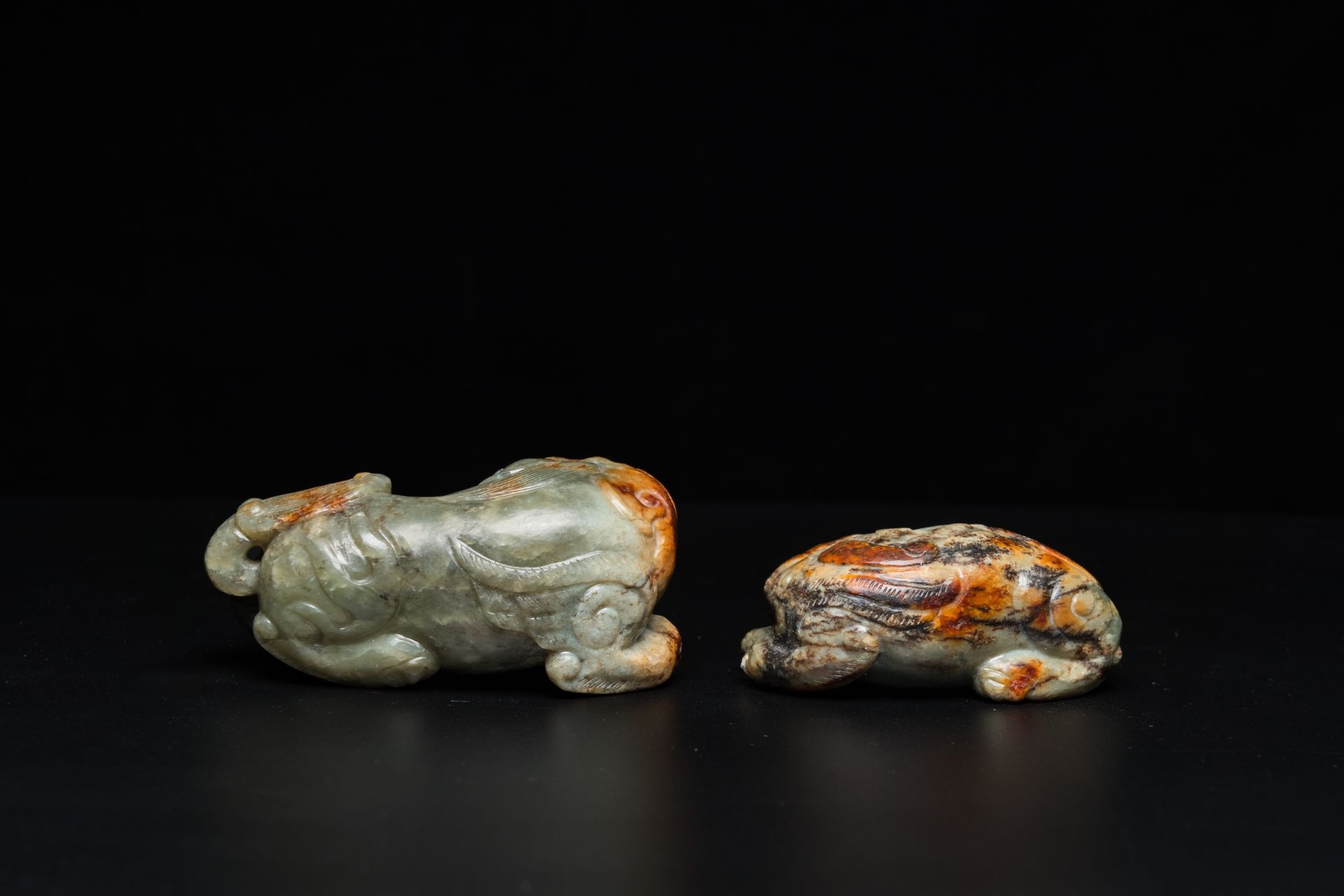Two Chinese celadon and russet jade Buddhist lion sculptures, Qing - Image 4 of 21