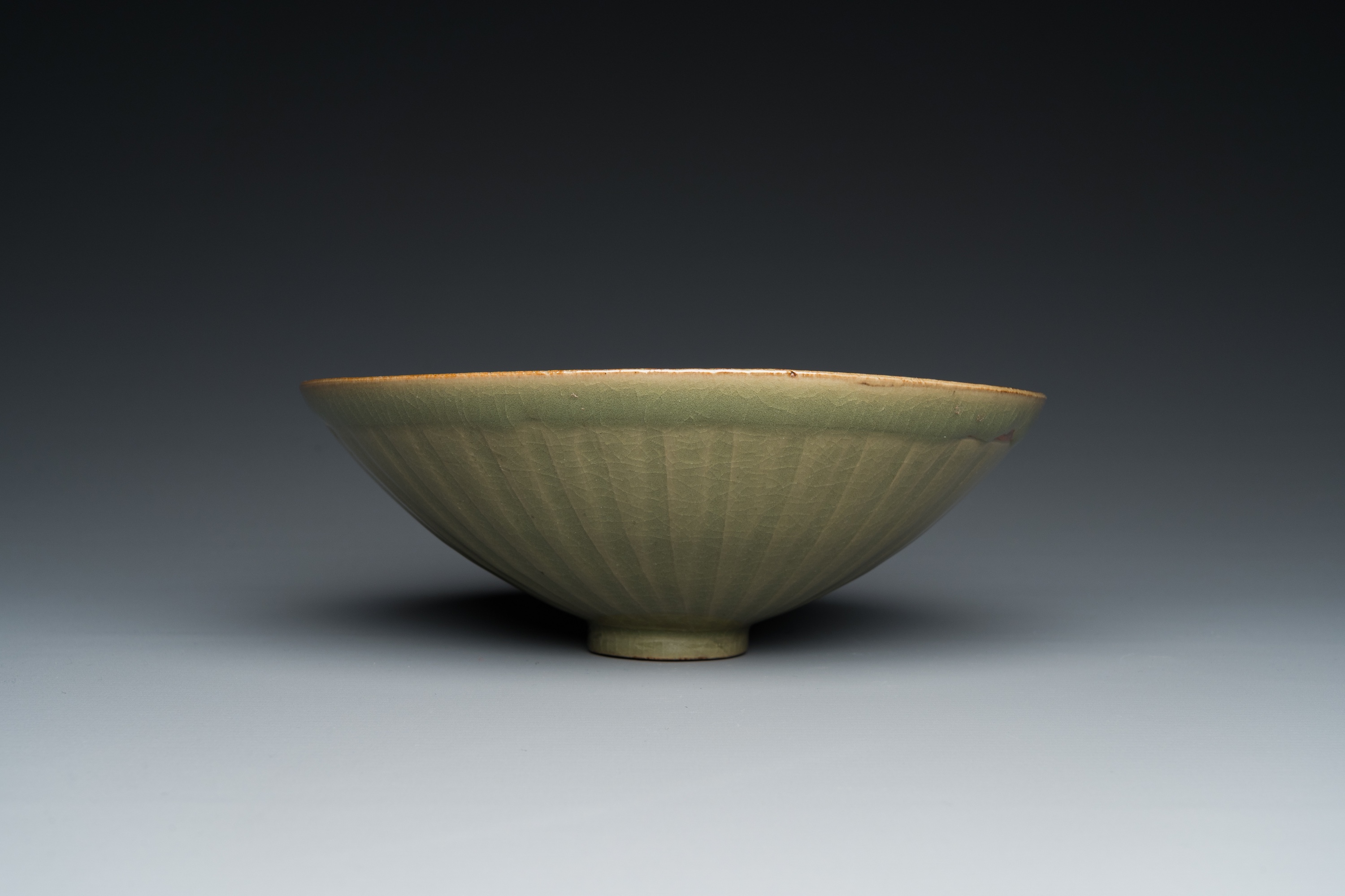 A Chinese Yaozhou celadon bowl with underglaze floral design, probably Song - Image 3 of 7