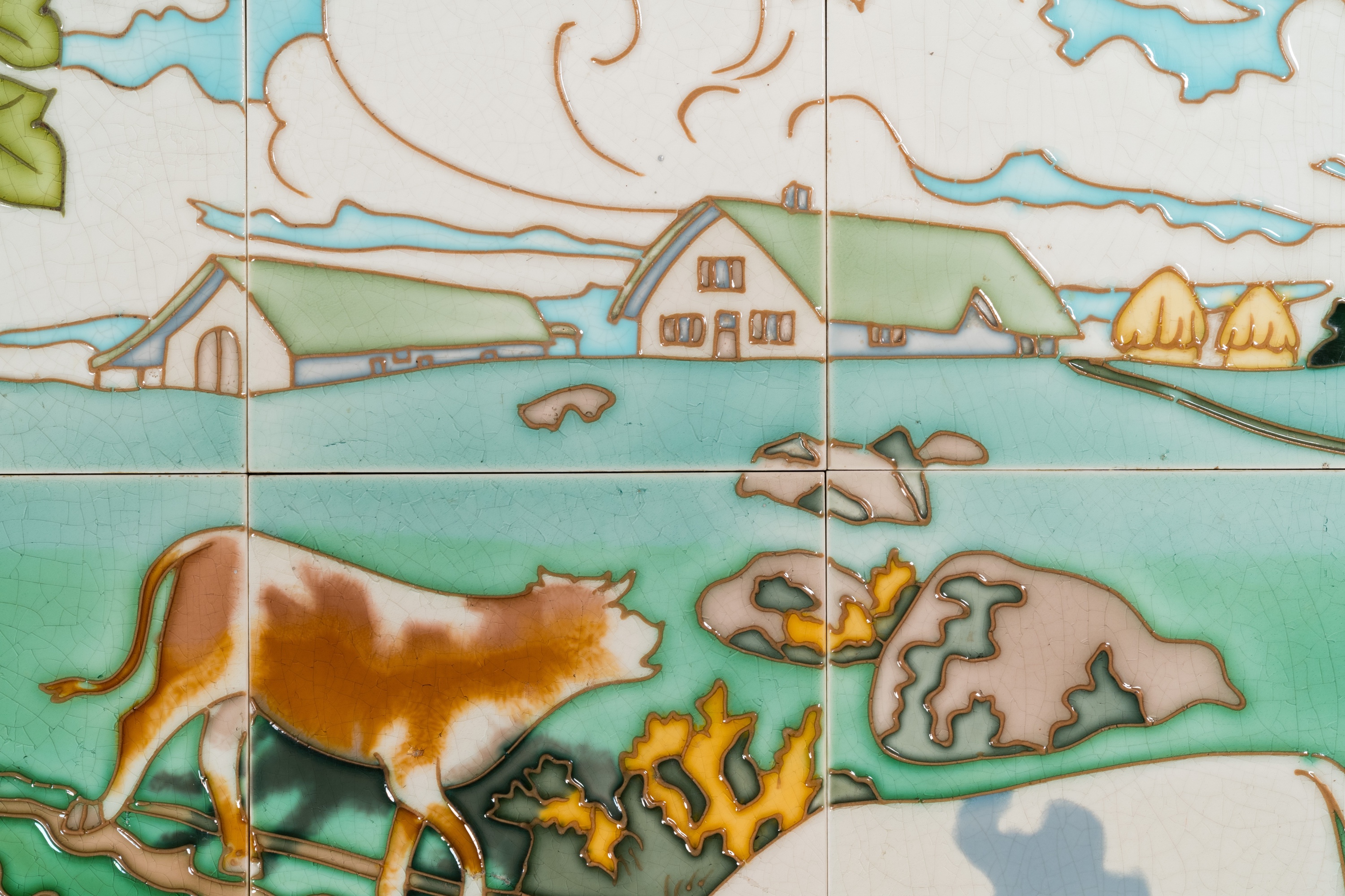 An Art Nouveau tile mural with a shepherdess and her cows in a meadow, Gilliot & Cie., Hemiksem - Image 4 of 4