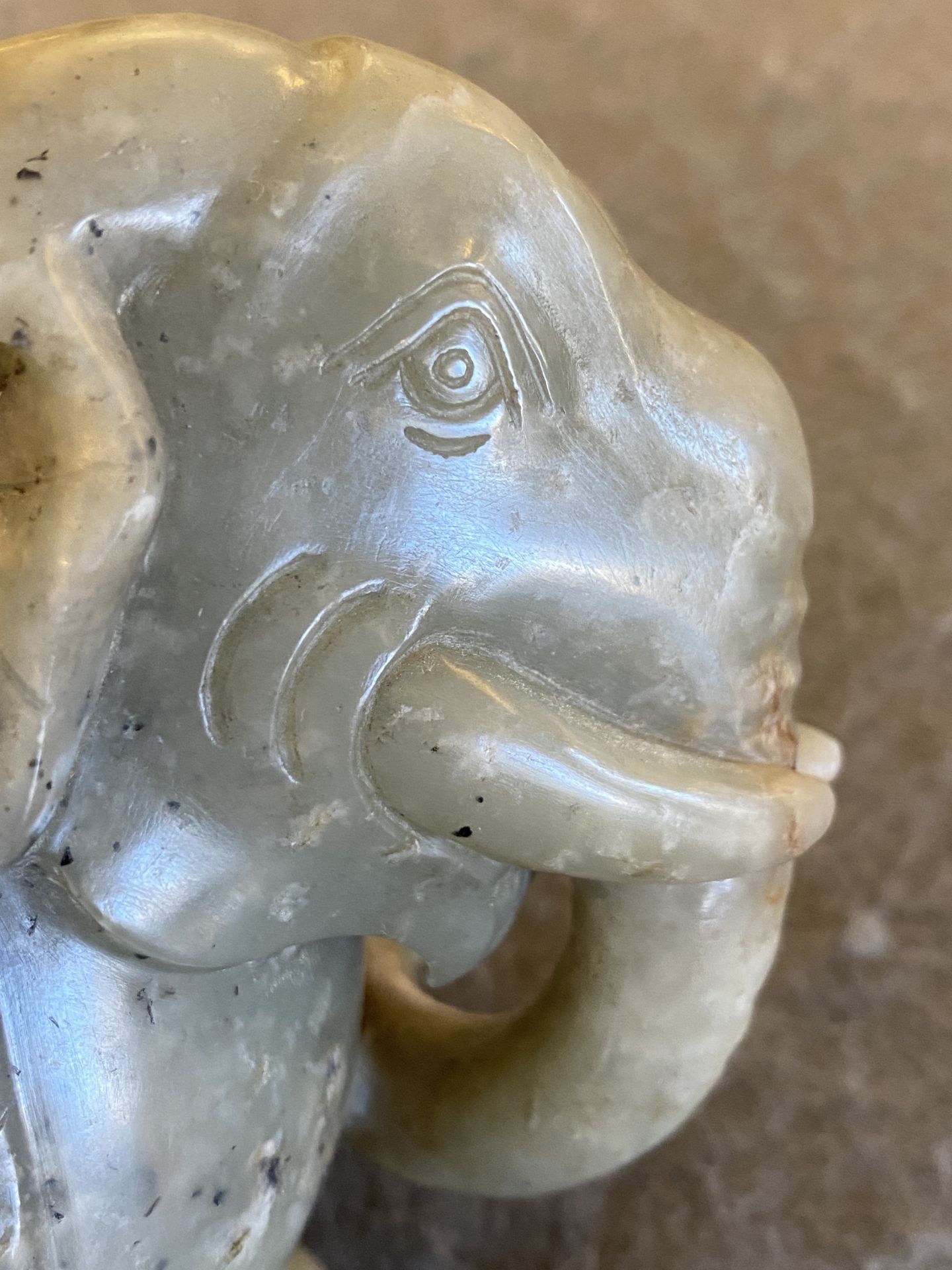 A Chinese grey-speckled celadon jade elephant, Qing - Image 15 of 18