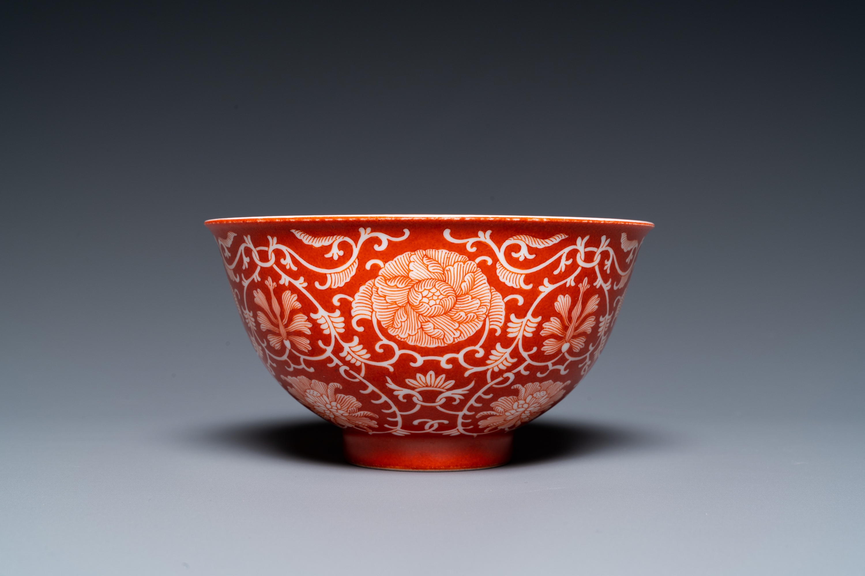 A Chinese coral-ground reserve-decorated 'lotus' bowl, Jiaqing mark, 19/20th C. - Image 2 of 18