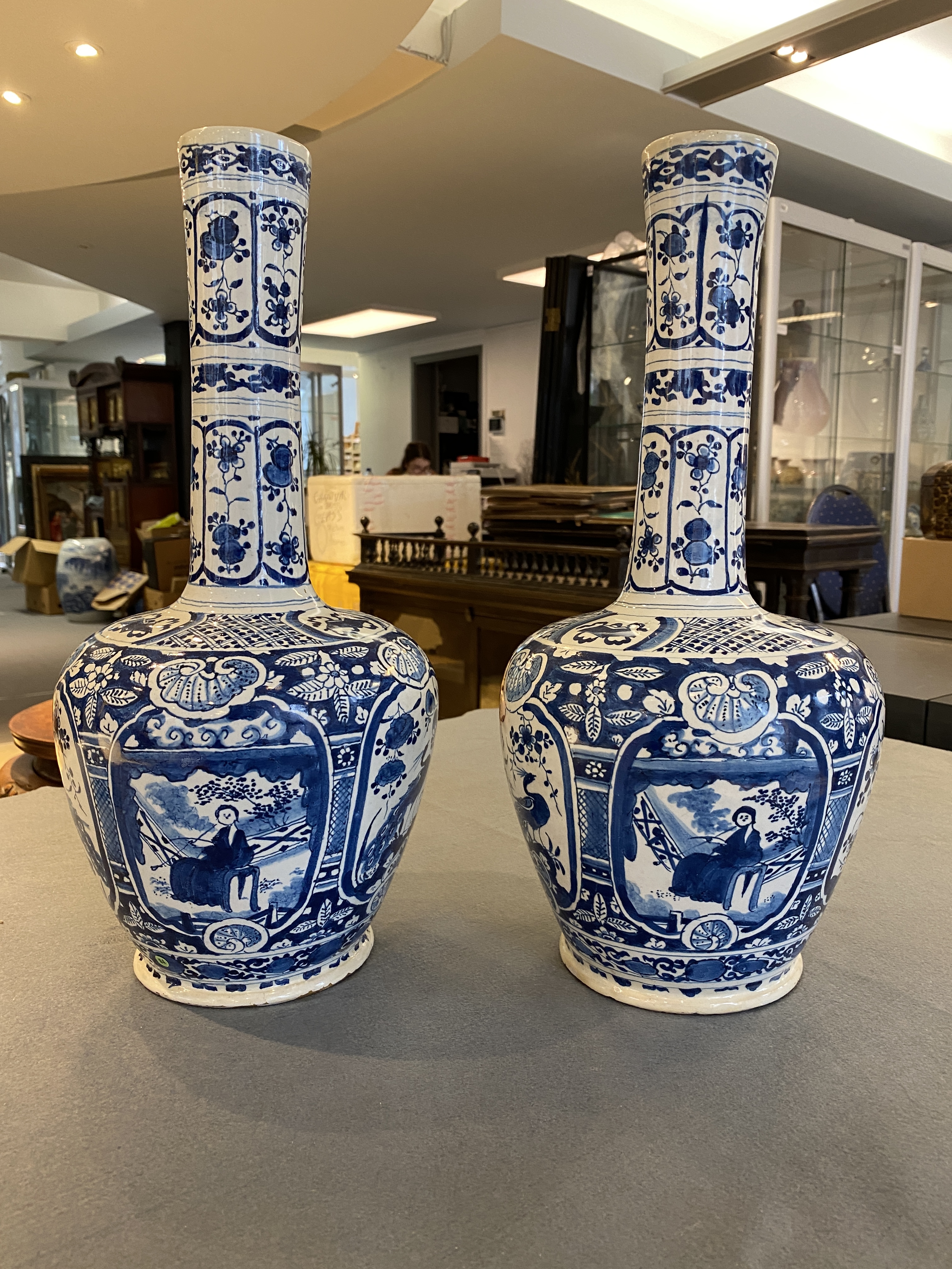 A pair of Dutch Delft blue and white chinoiserie bottle vases, 18th C. - Image 9 of 33