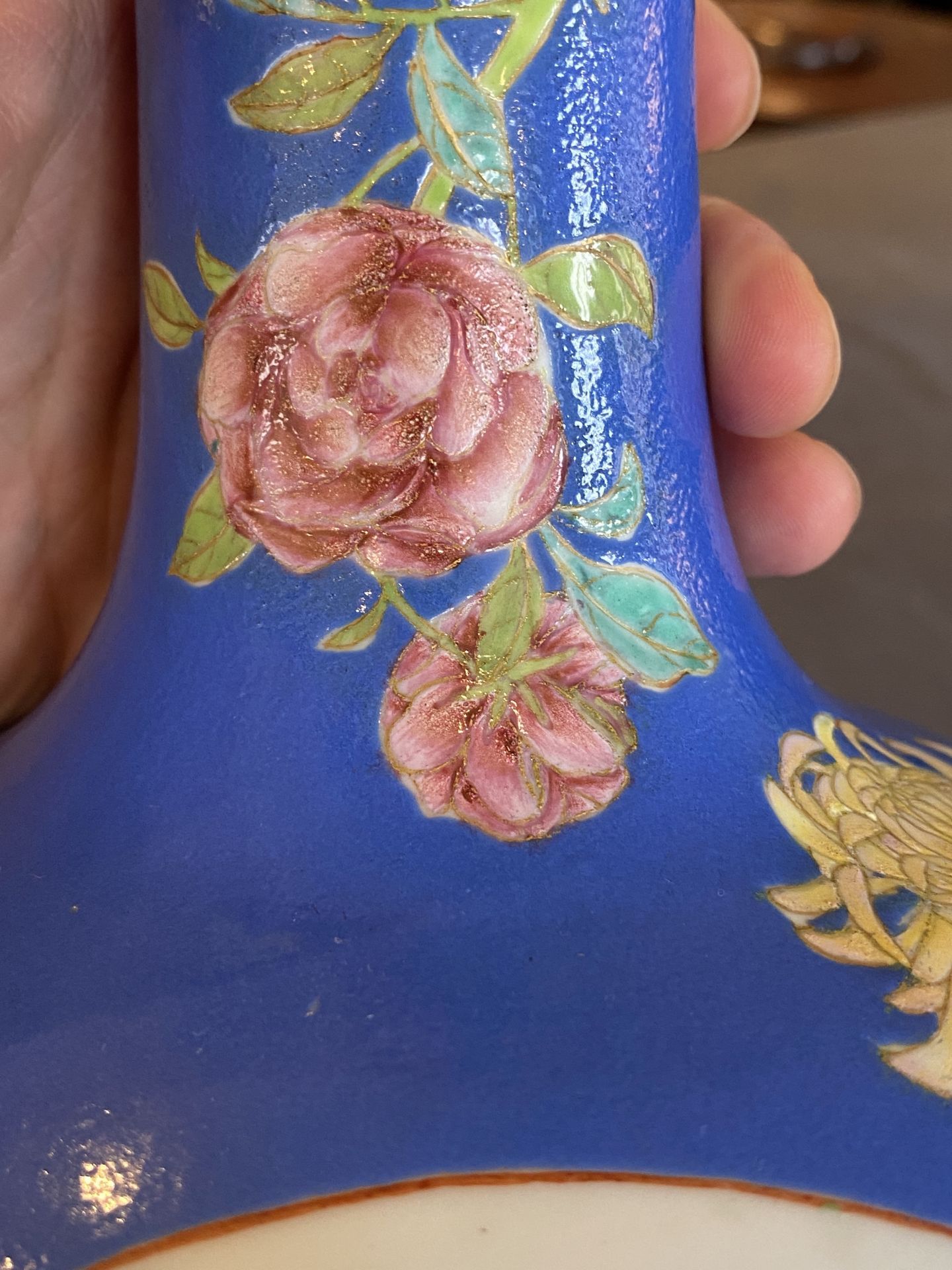 A pair of Chinese blue-ground famille rose vases, He Xuren ___ seal mark, 20th C. - Image 22 of 28