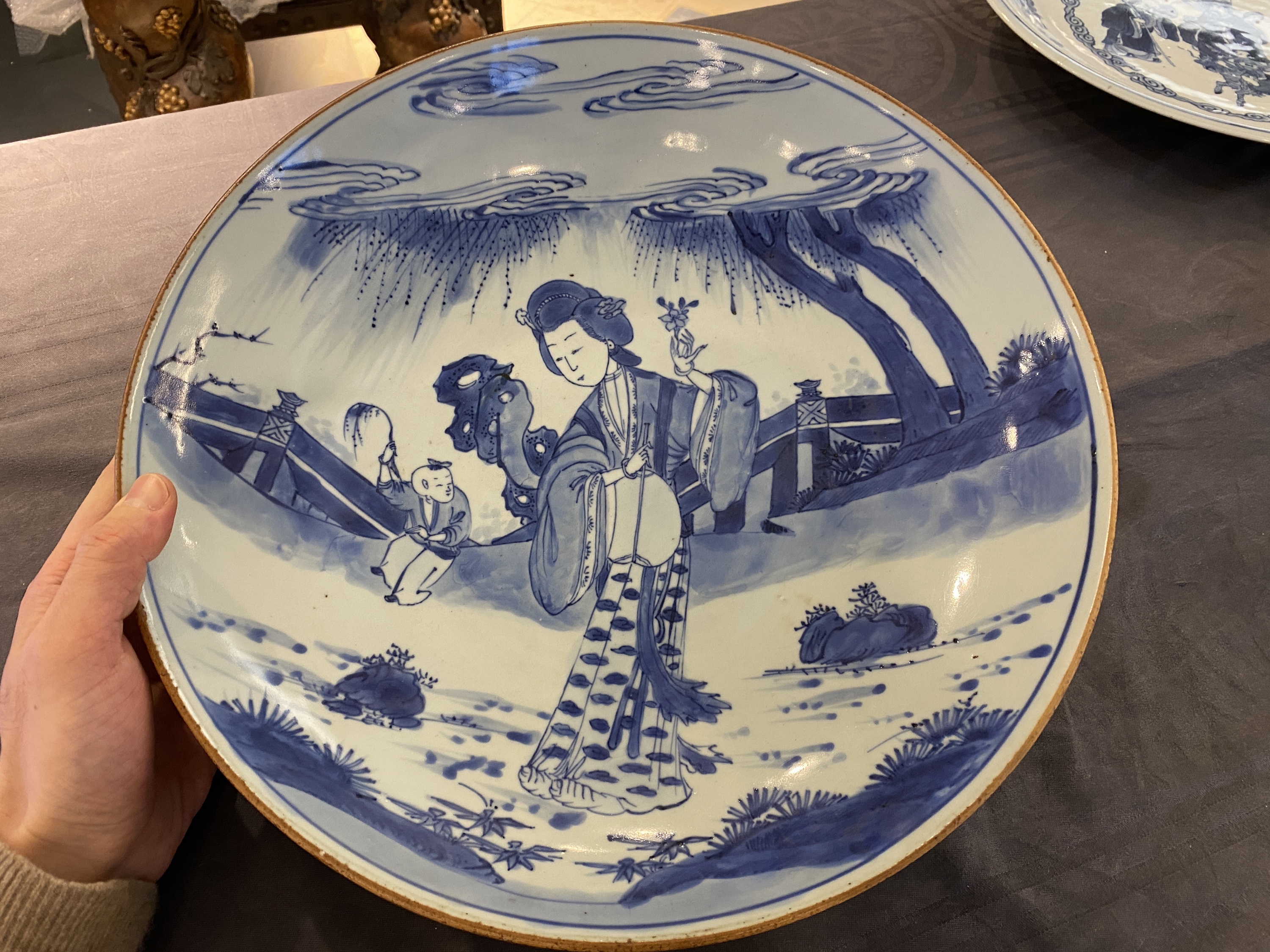 A large Chinese blue and white 'lady and boy' dish, Kangxi mark and of the period - Image 3 of 13