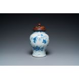 A Chinese blue and white vase with birds among blossoming branches, Transitional period