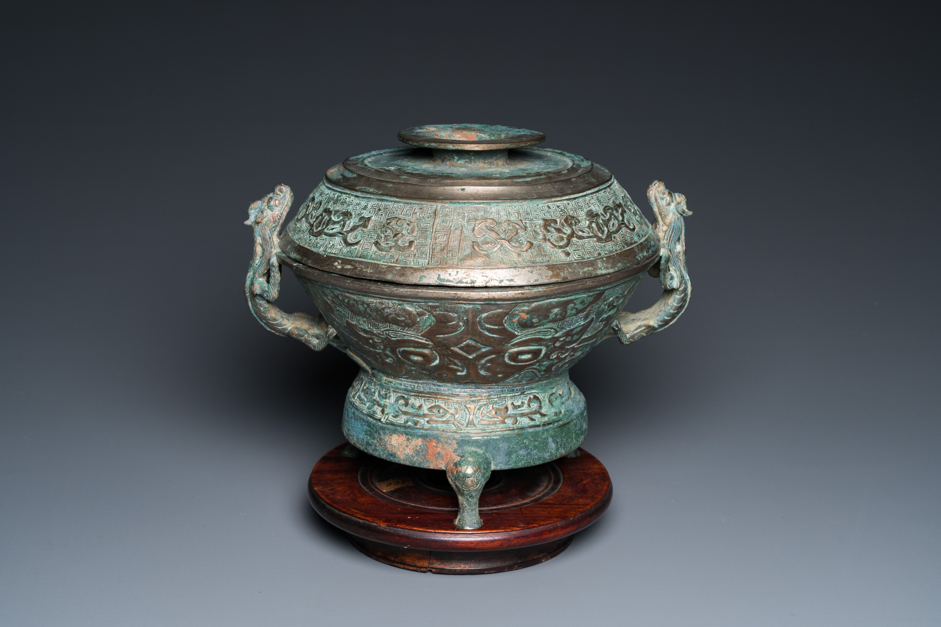 A Chinese inscribed archaistic bronze tripod censer and cover, Ming