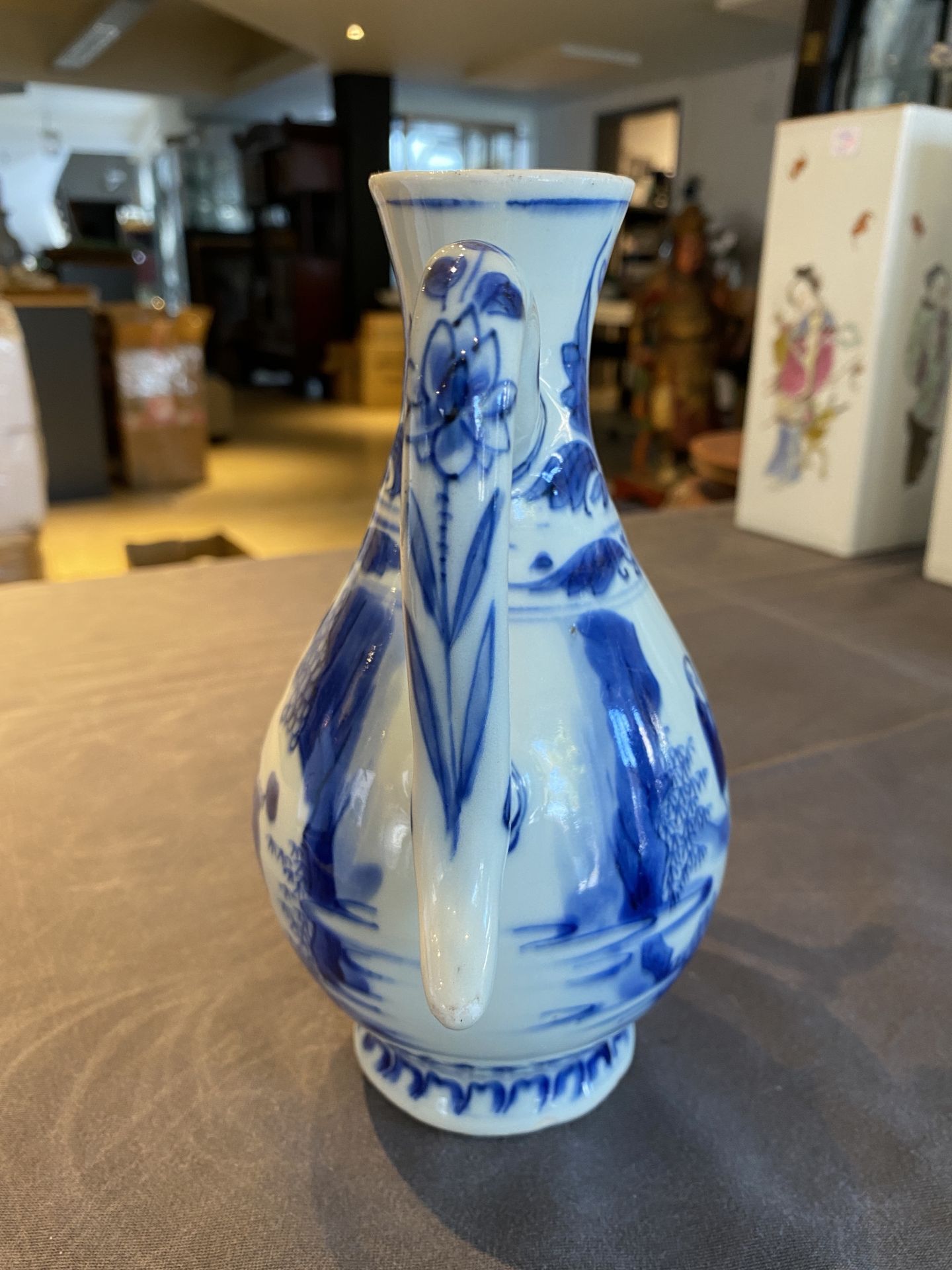 A Chinese blue and white ewer with figures in a landscape, Transitional period - Image 8 of 24