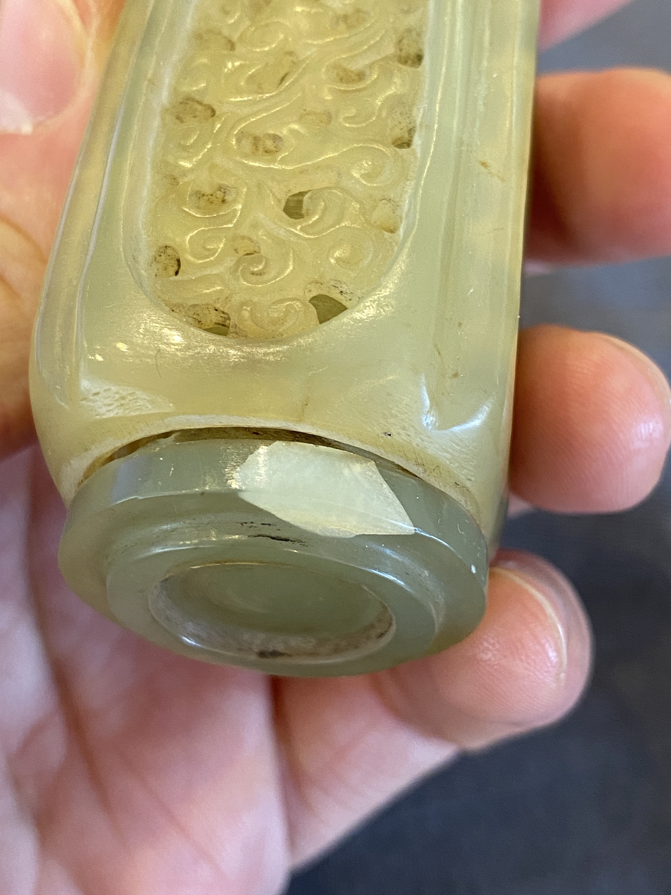 A Chinese reticulated and movable celadon jade snuff bottle, Qing - Image 11 of 11