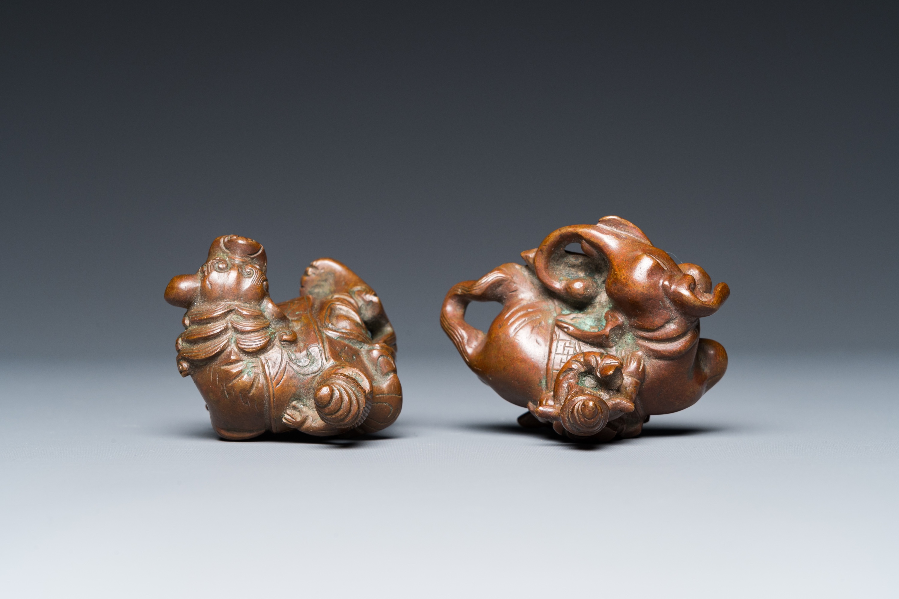 Two Chinese bronze scroll Weights with Sogdian riders on a Buddhist lion and an elephant, Qi - Image 6 of 19