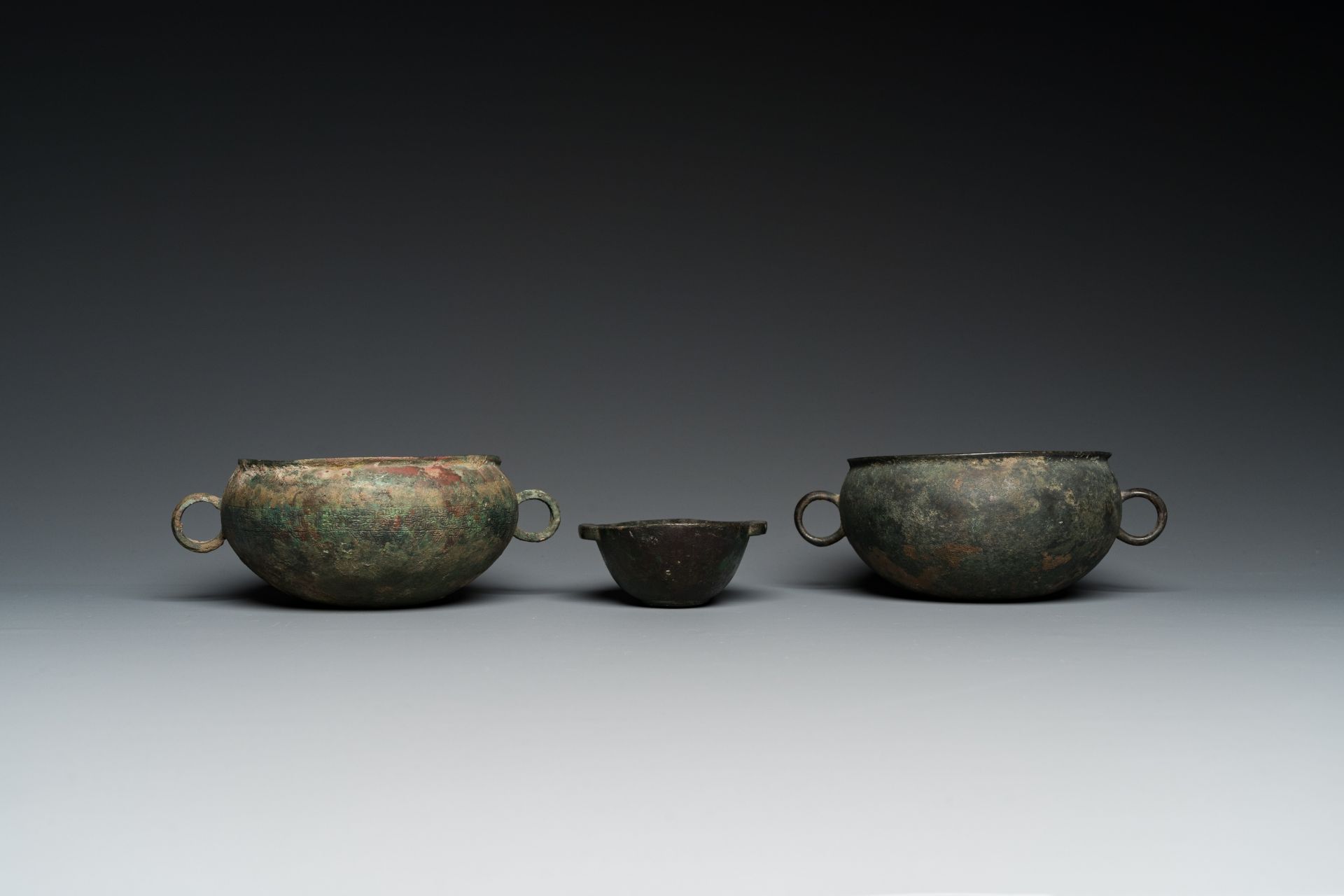 Three Chinese elliptical bronze cups, Eastern Zhou and Han - Image 2 of 8