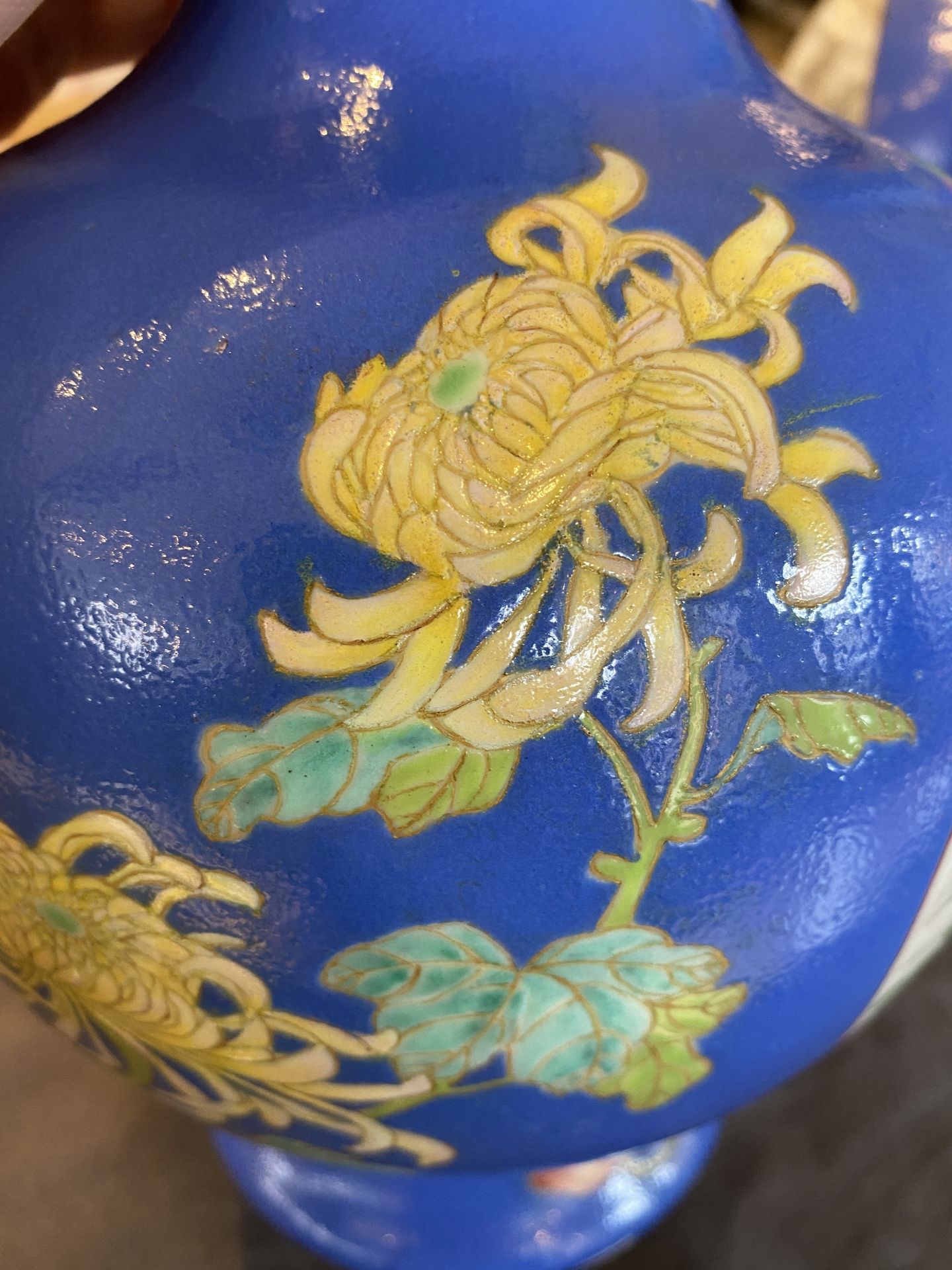 A pair of Chinese blue-ground famille rose vases, He Xuren ___ seal mark, 20th C. - Image 11 of 28