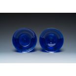 A pair of Chinese blue Beijing glass plates, 18/19th C.