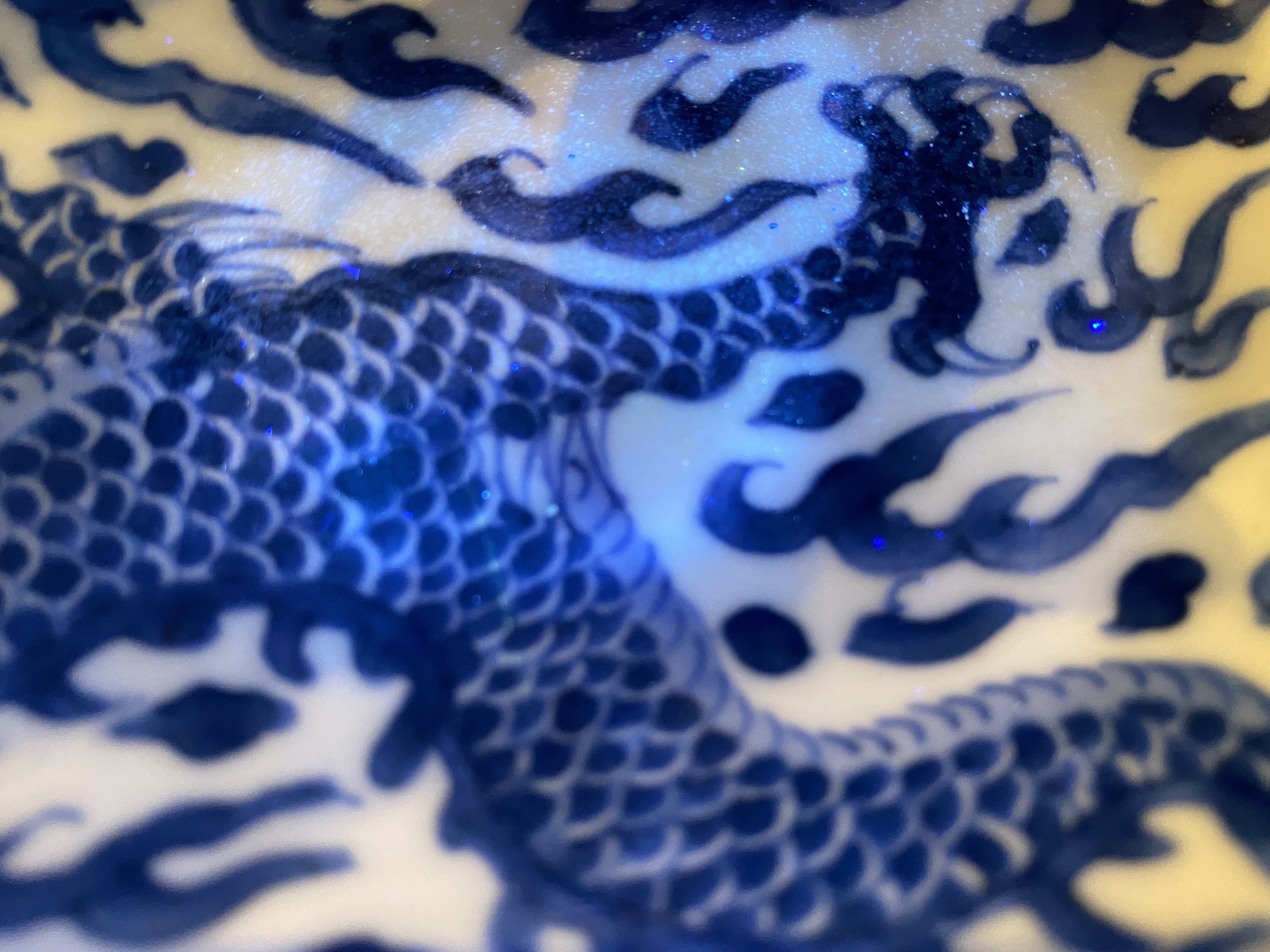 A Chinese blue and white 'dragon' dish, Kangxi mark and of the period - Image 16 of 18