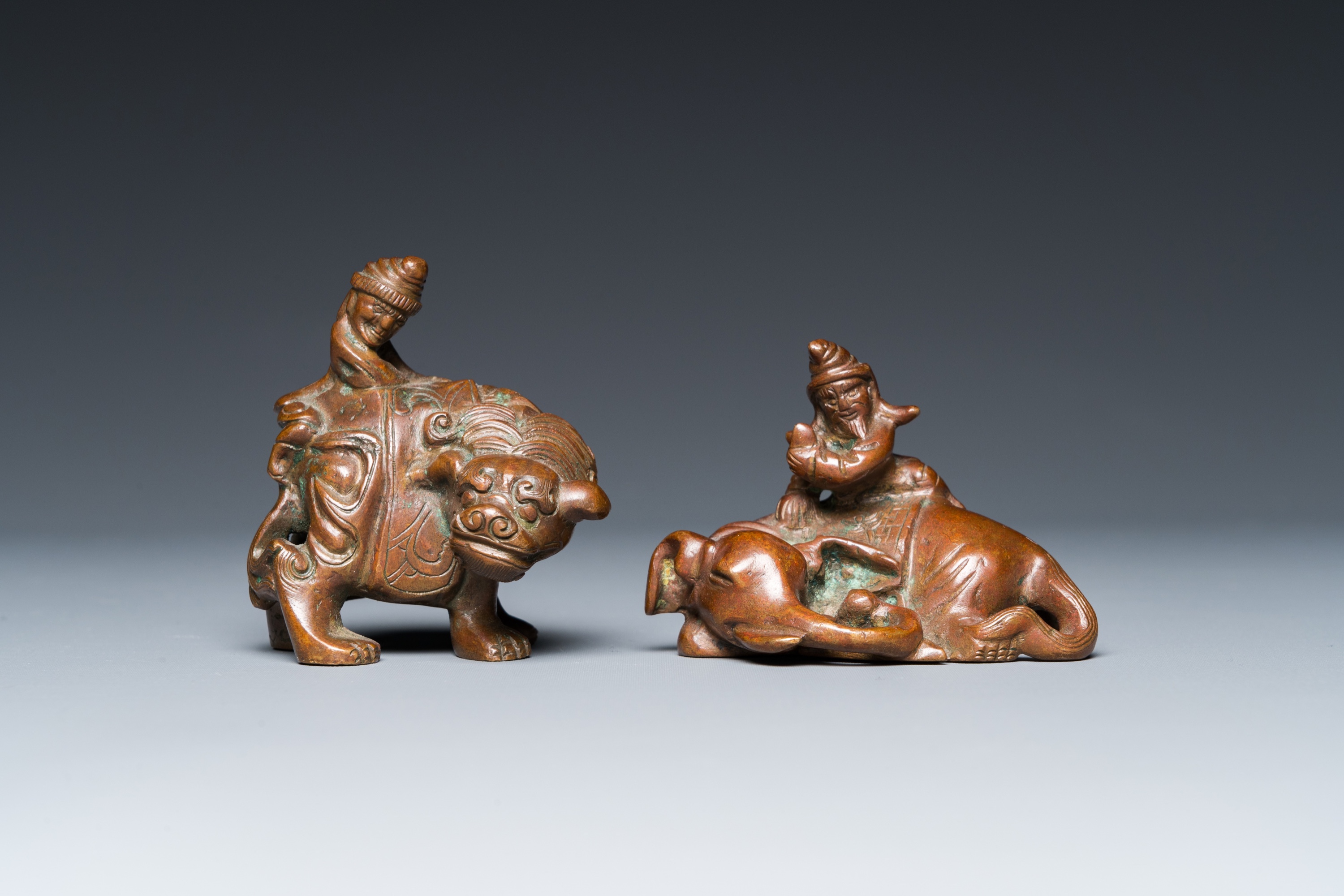 Two Chinese bronze scroll Weights with Sogdian riders on a Buddhist lion and an elephant, Qi - Image 2 of 19