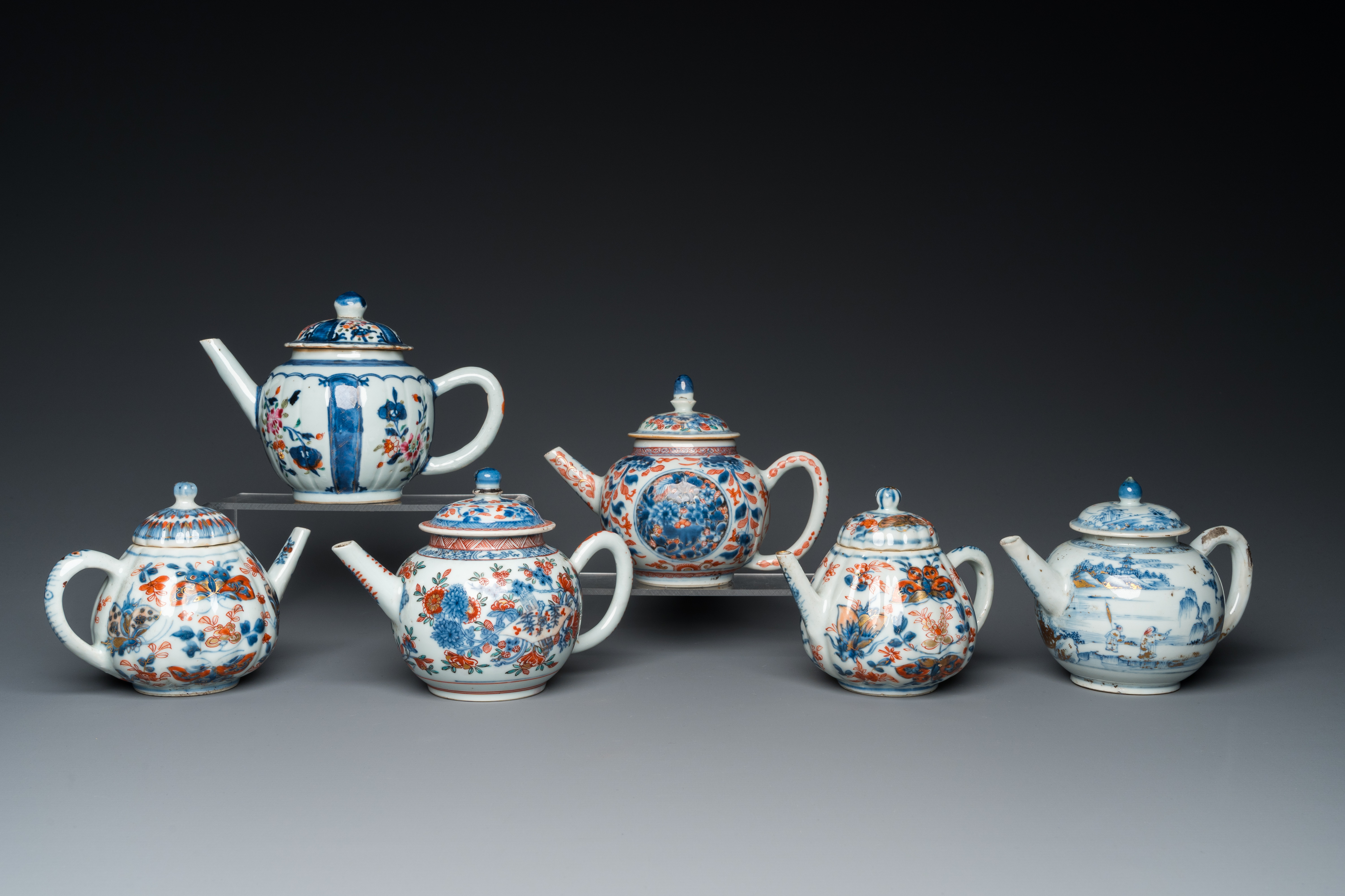 Six Chinese blue and white, famille verte and Imari-style teapots, Kangxi/Yongzheng