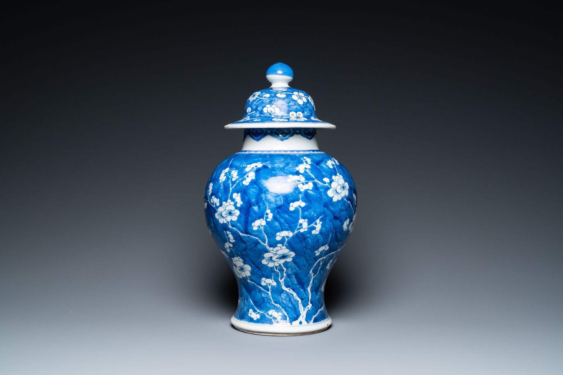 A Chinese blue and white 'prunus on cracked ice' vase and cover, Kangxi - Image 2 of 29