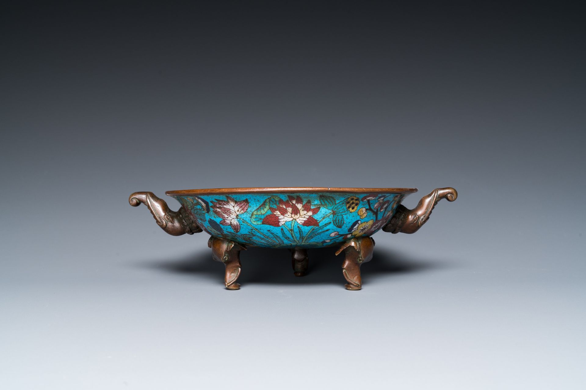 A Chinese cloisonnŽ tripod 'phoenix' bowl with elephant head handles, Qianlong/Jiaqing - Image 3 of 7