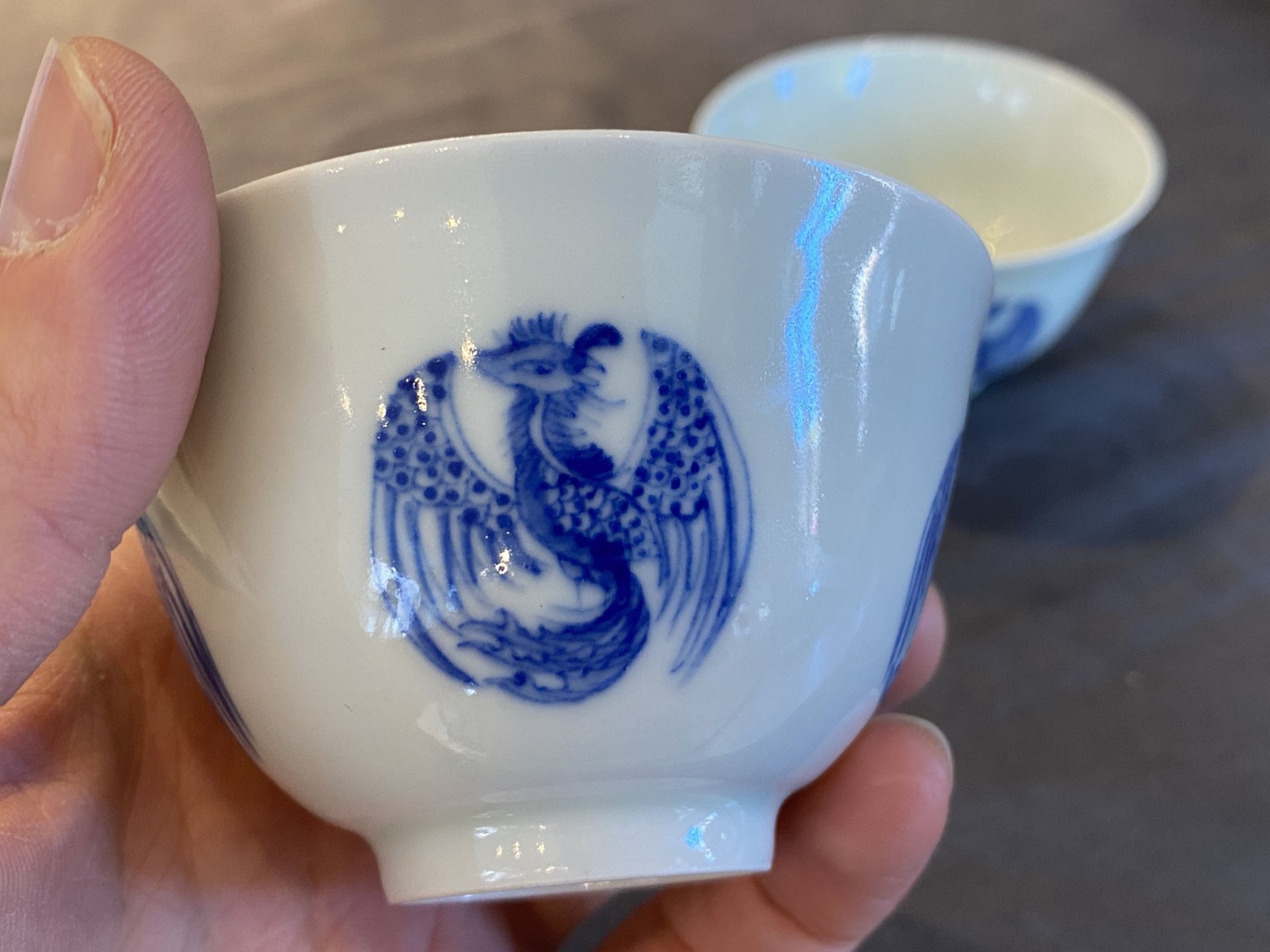 A pair of Chinese blue and white cups, Daoguang mark, 19/20th C. - Image 12 of 17