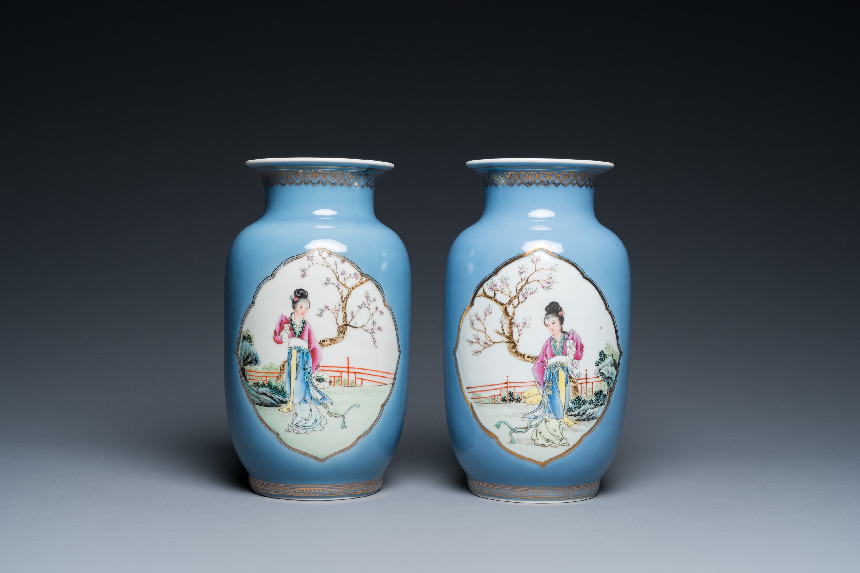 A pair of Chinese famille rose lavender blue-ground vases, Qianlong mark, Republic