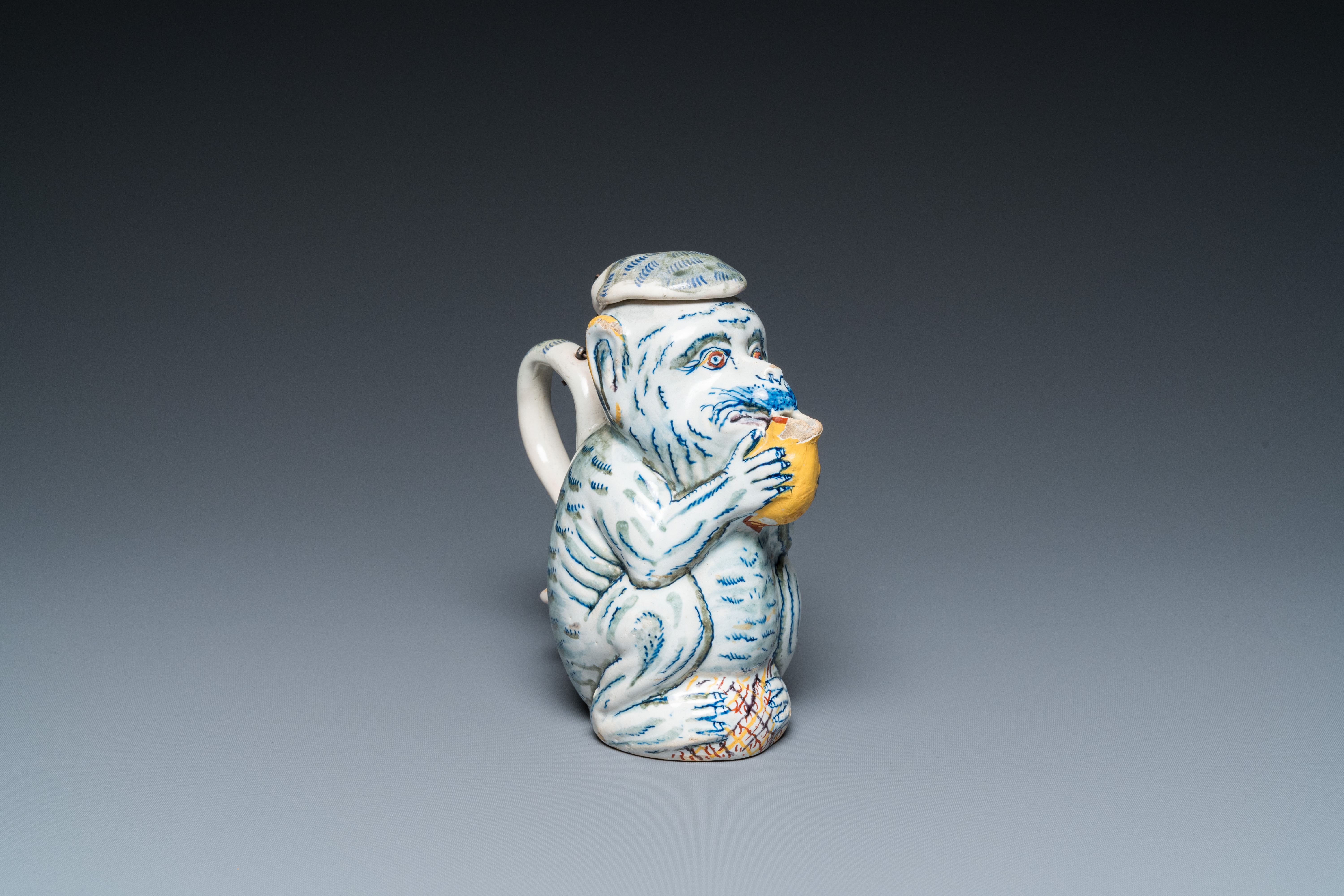 A polychrome Dutch Delft 'monkey' jug, 18th C;