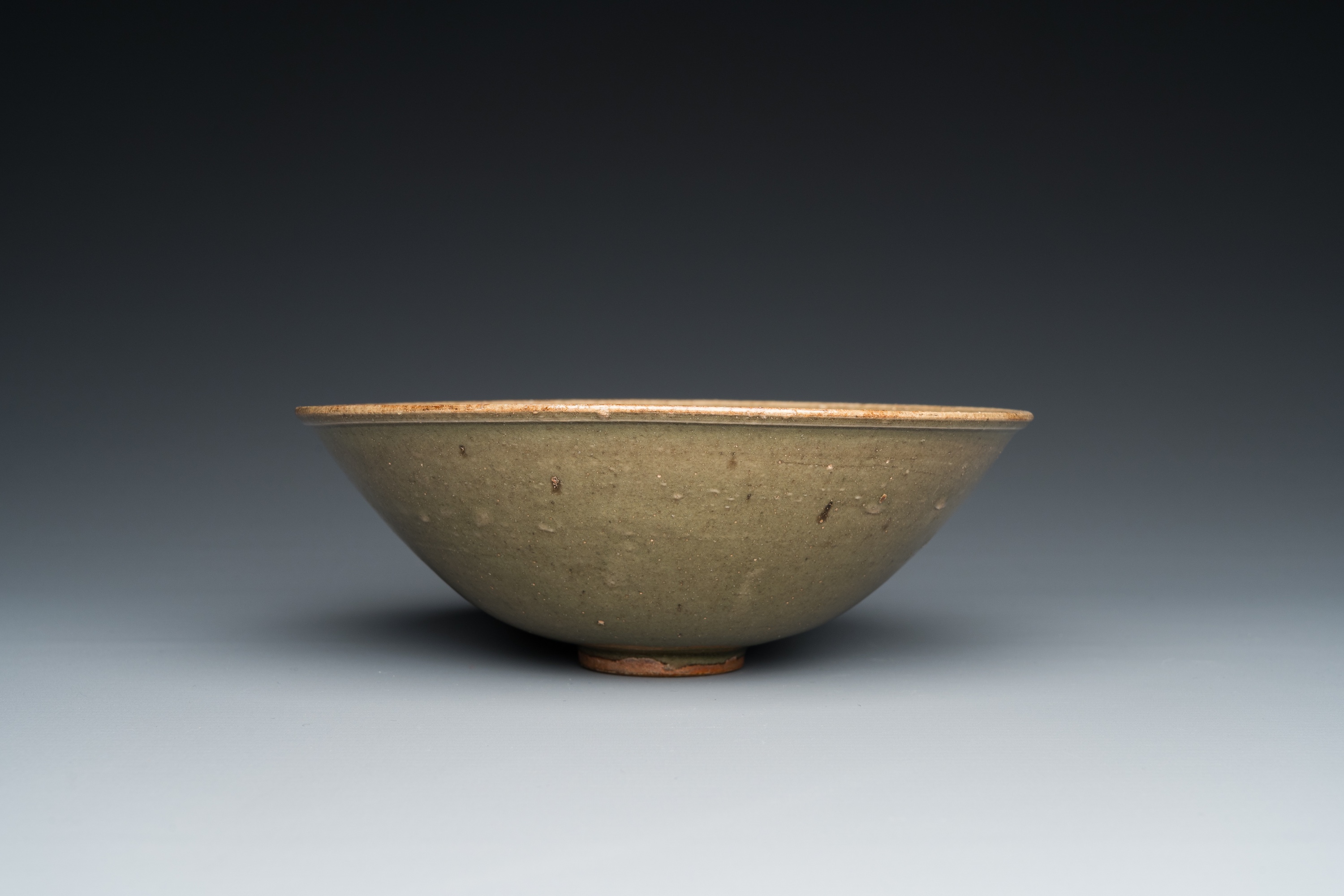 A Chinese Yaozhou celadon bowl with underglaze floral design, probably Ming - Image 3 of 7