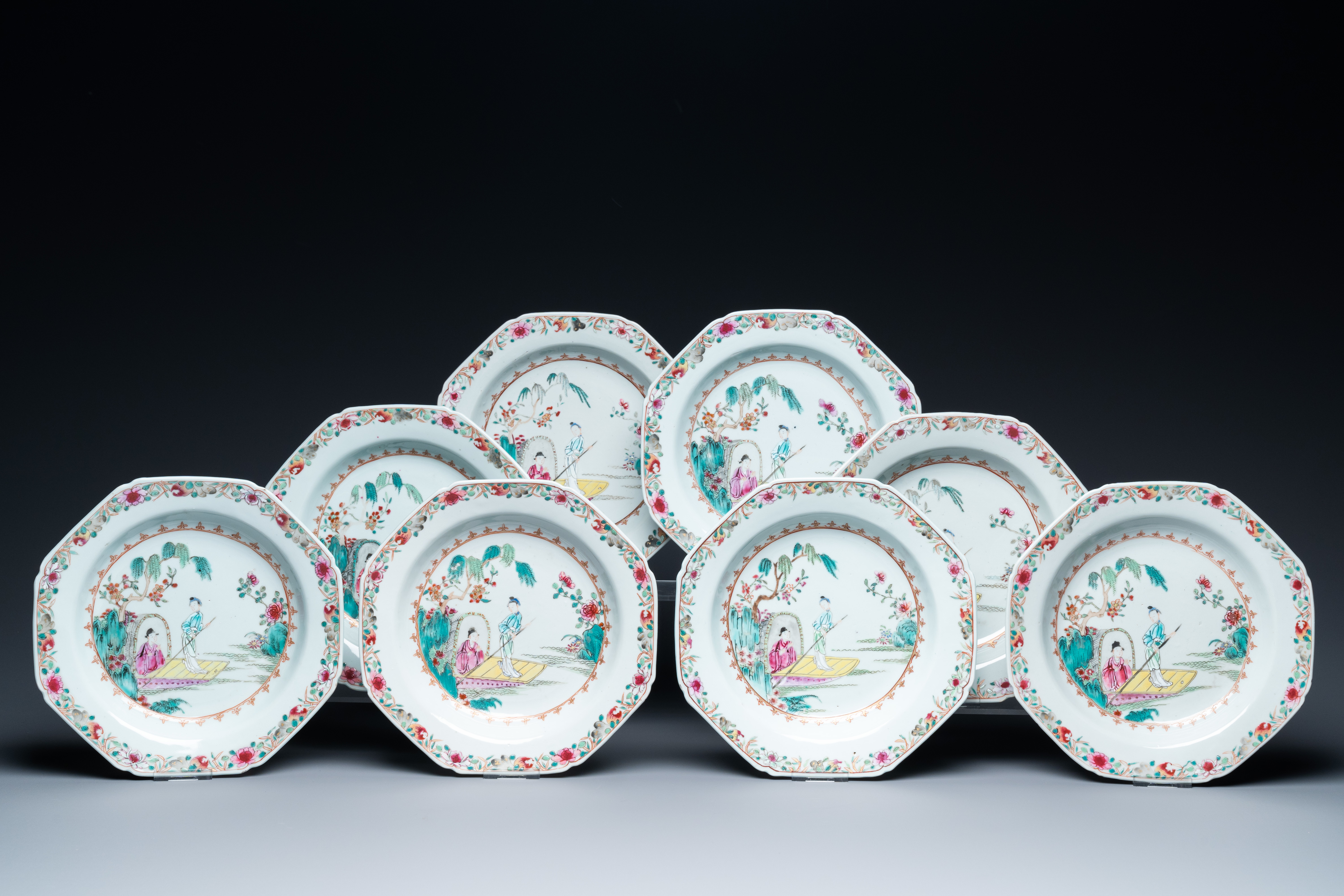 Eight octagonal Chinese famille rose plates with a boat on the water, Qianlong