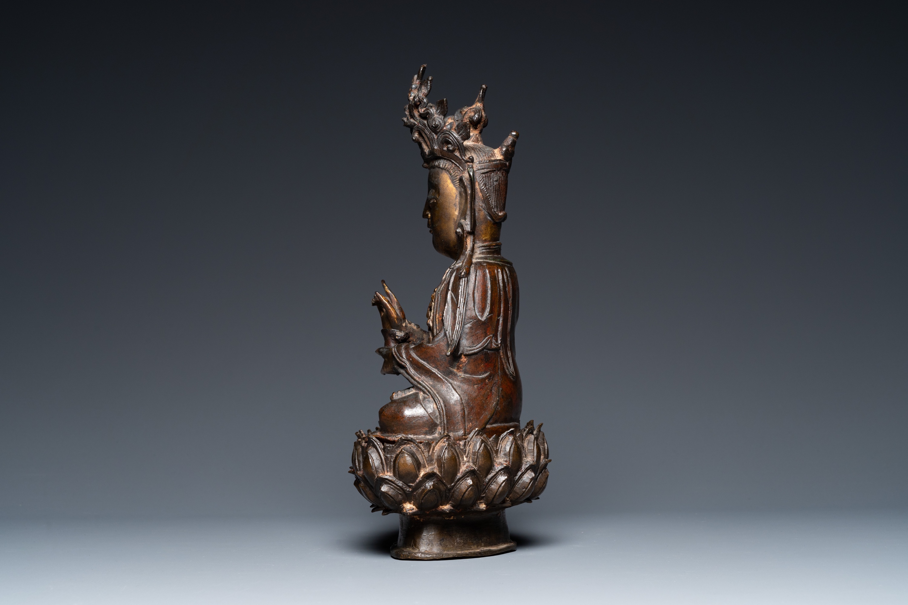 A Chinese partly gilt bronze figure of Guanyin on a lotus throne, Ming - Image 3 of 31