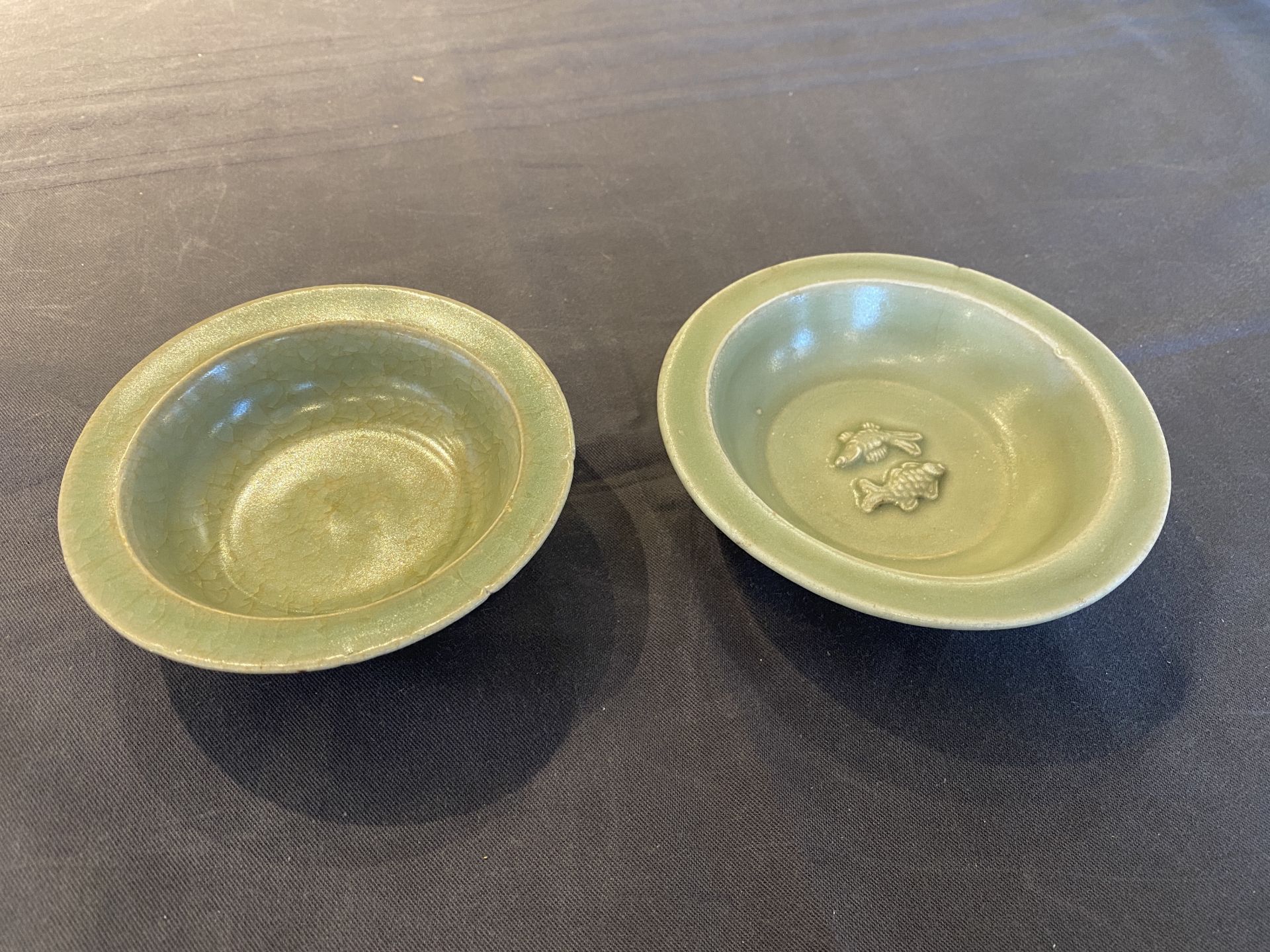 Two Chinese celadon-glazed bowls, one with twin fish, Ming - Image 4 of 14