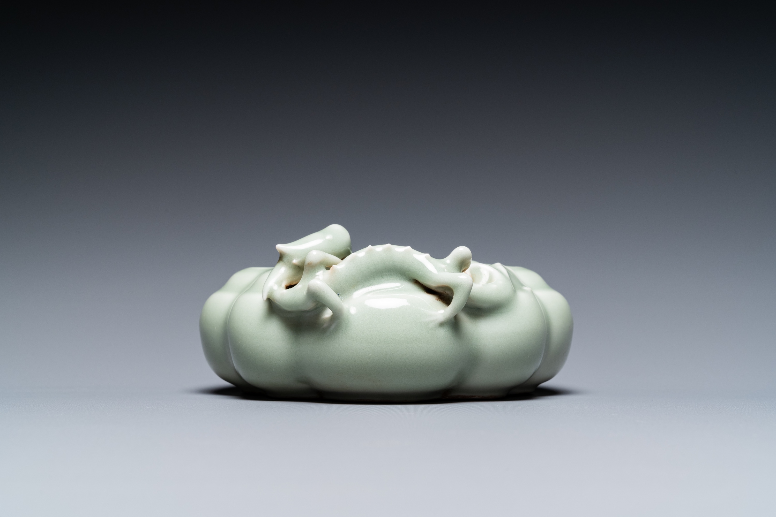 A Chinese celadon-glazed 'lingzhi' brush washer, Qianlong mark, 19/20th C. - Image 5 of 15