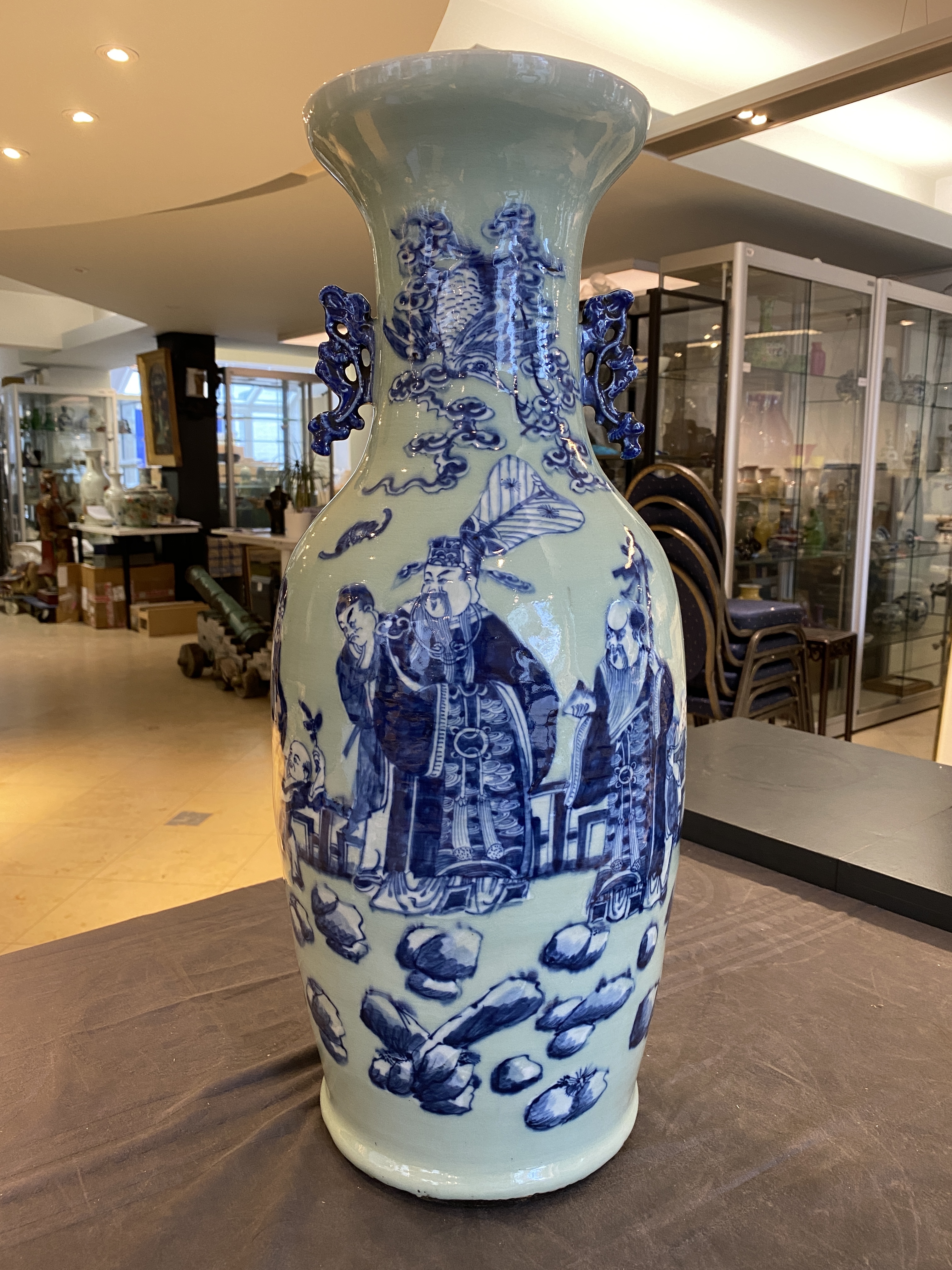 A Chinese blue and white celadon-ground 'immortals' vase, 19th C. - Image 7 of 17