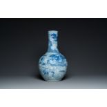 A Chinese blue and white 'dragons' bottle vase, 19th C.