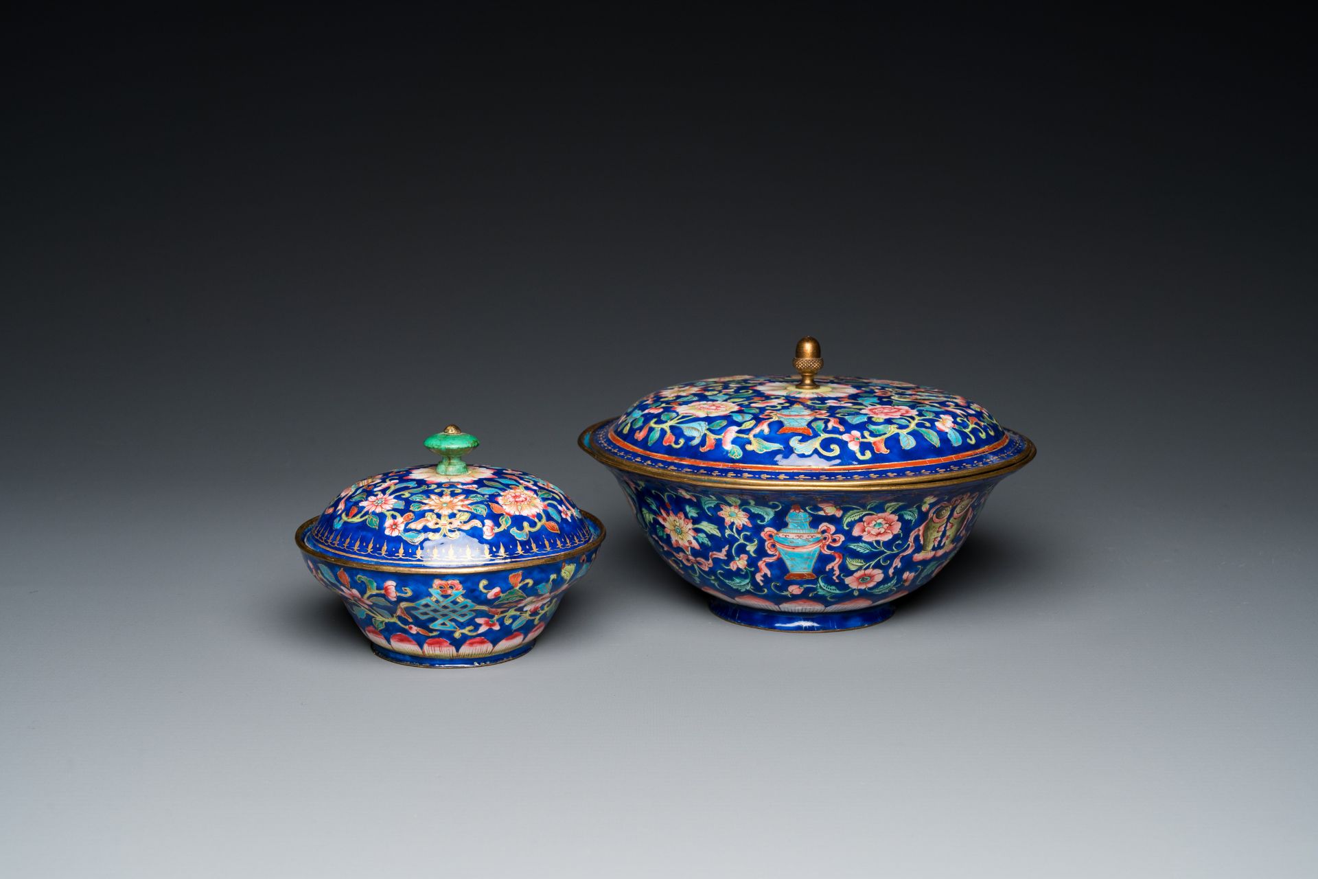 Two Chinese blue-ground Canton enamel bowls and covers, Qianlong/Jiaqing