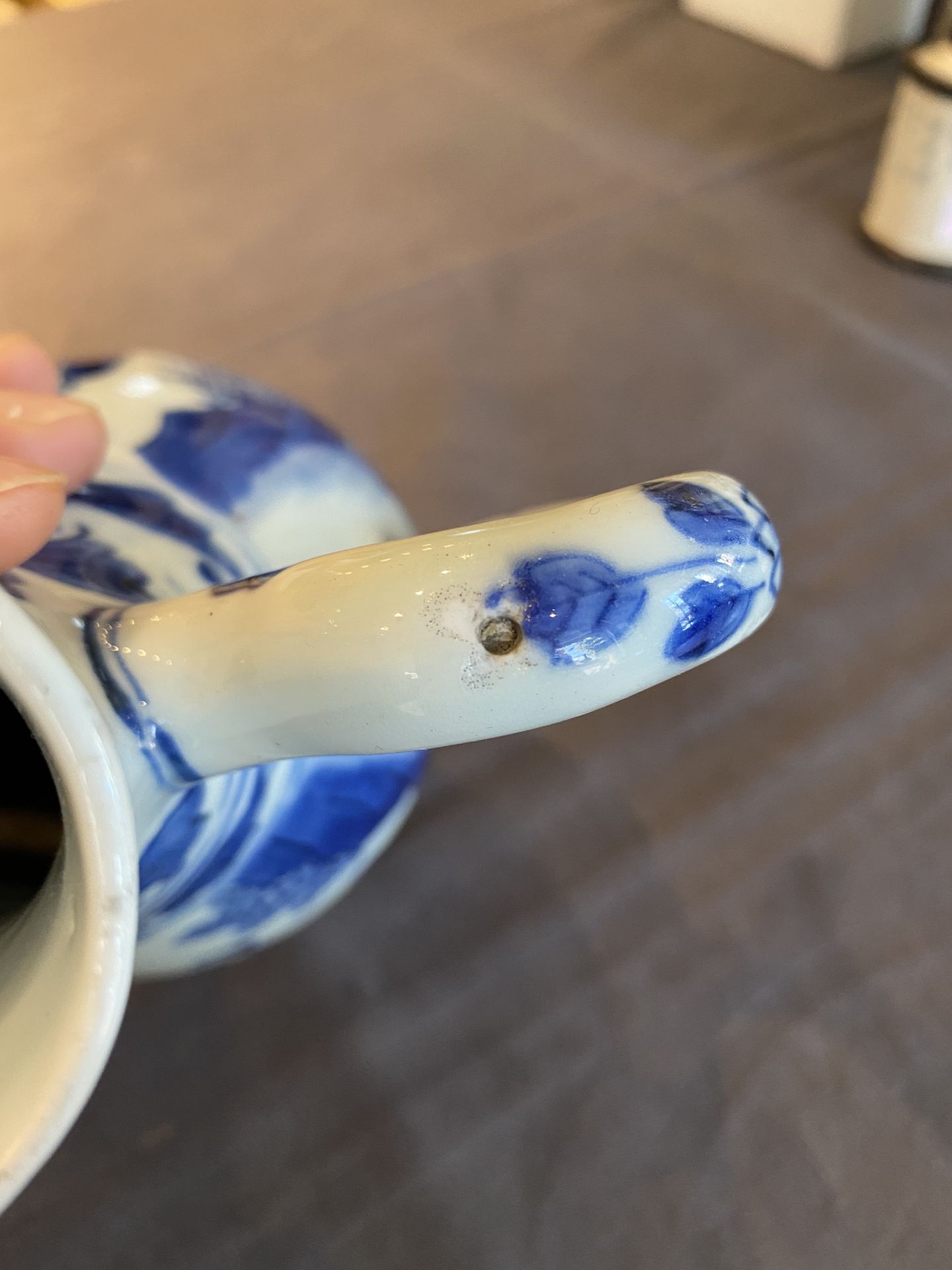 A Chinese blue and white ewer with figures in a landscape, Transitional period - Image 12 of 24