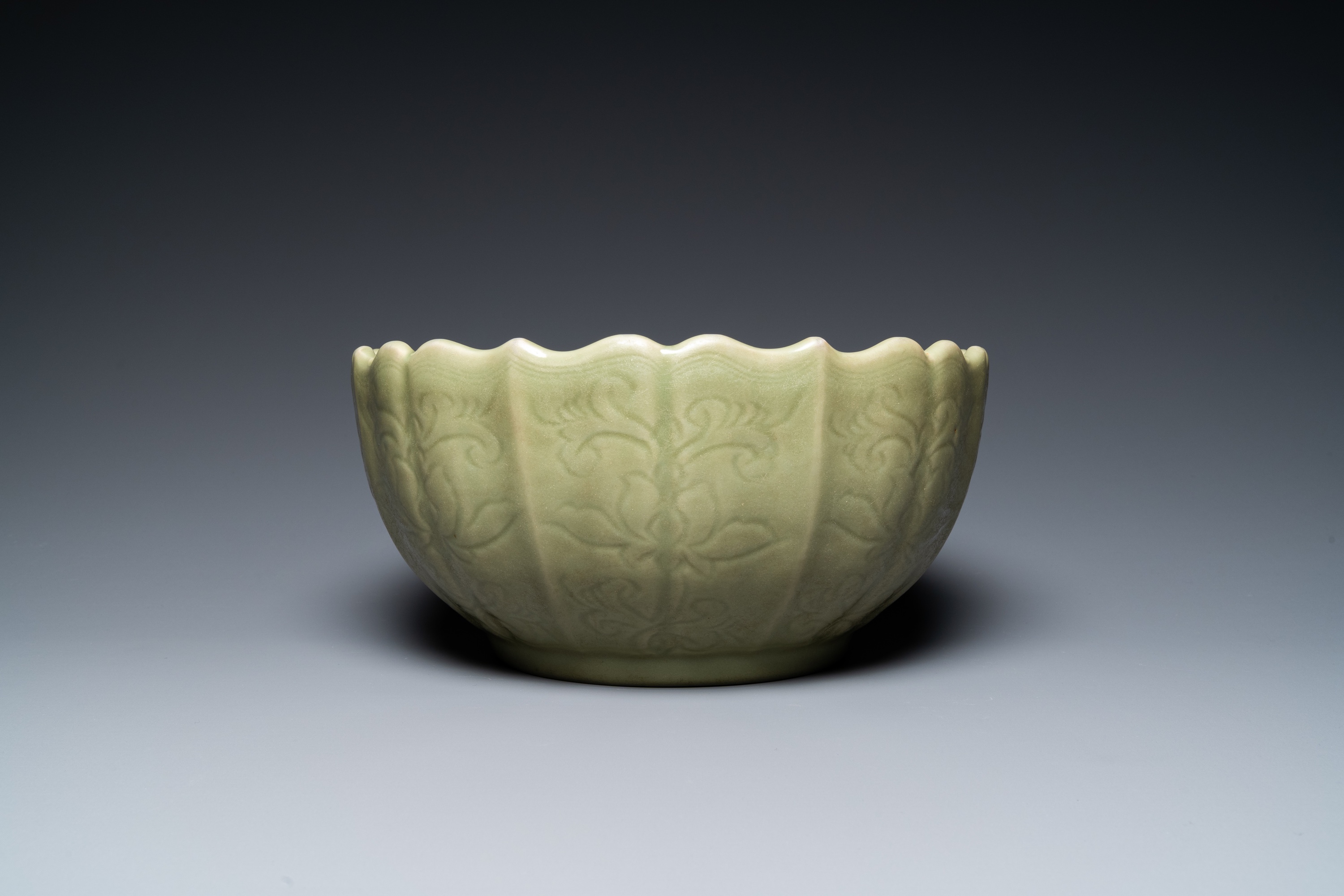 A large Chinese Longquan celadon bowl with underglaze lotus design, Ming - Image 3 of 17