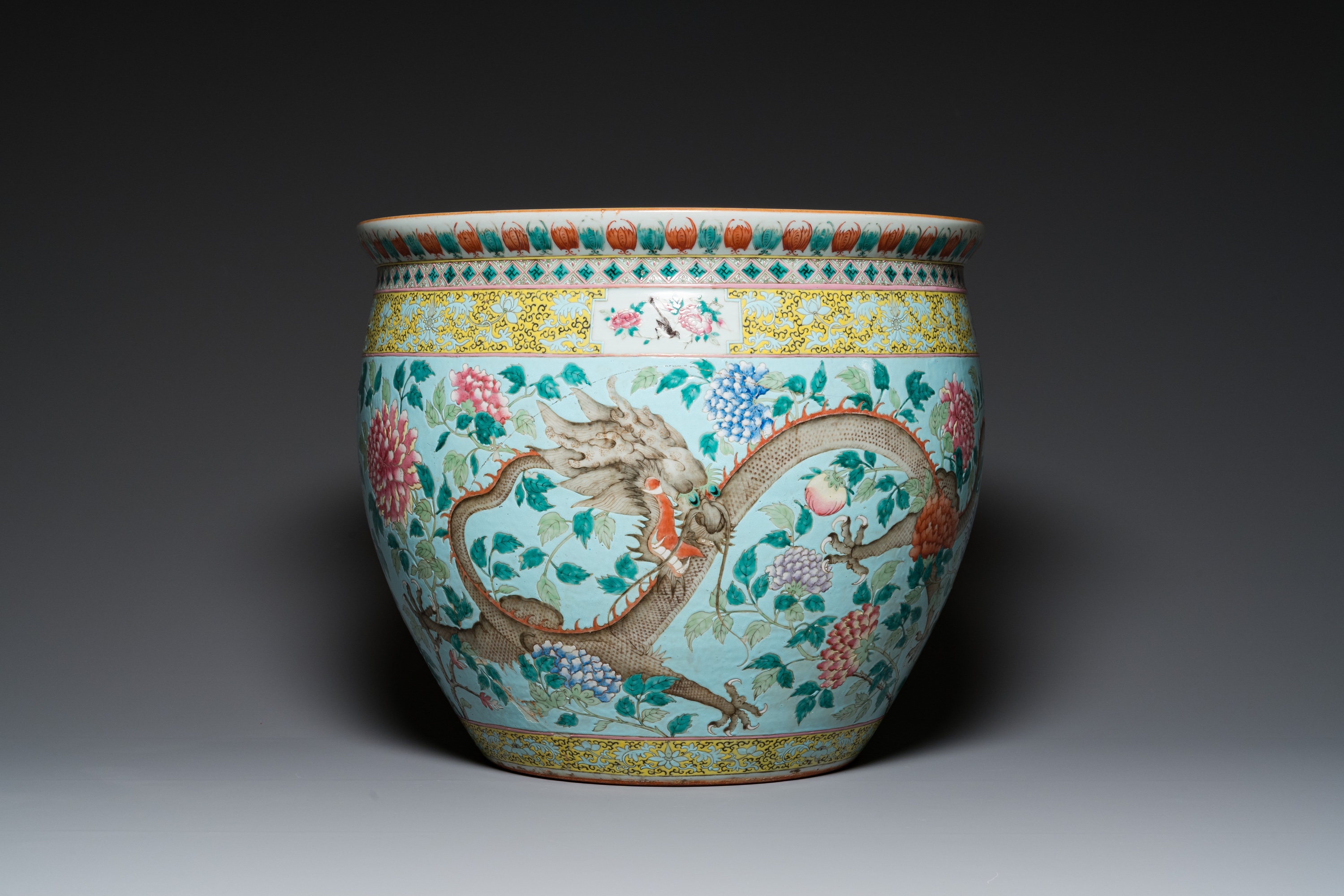 A large Chinese famille verte light blue-ground fish bowl, 19th C. - Image 4 of 28