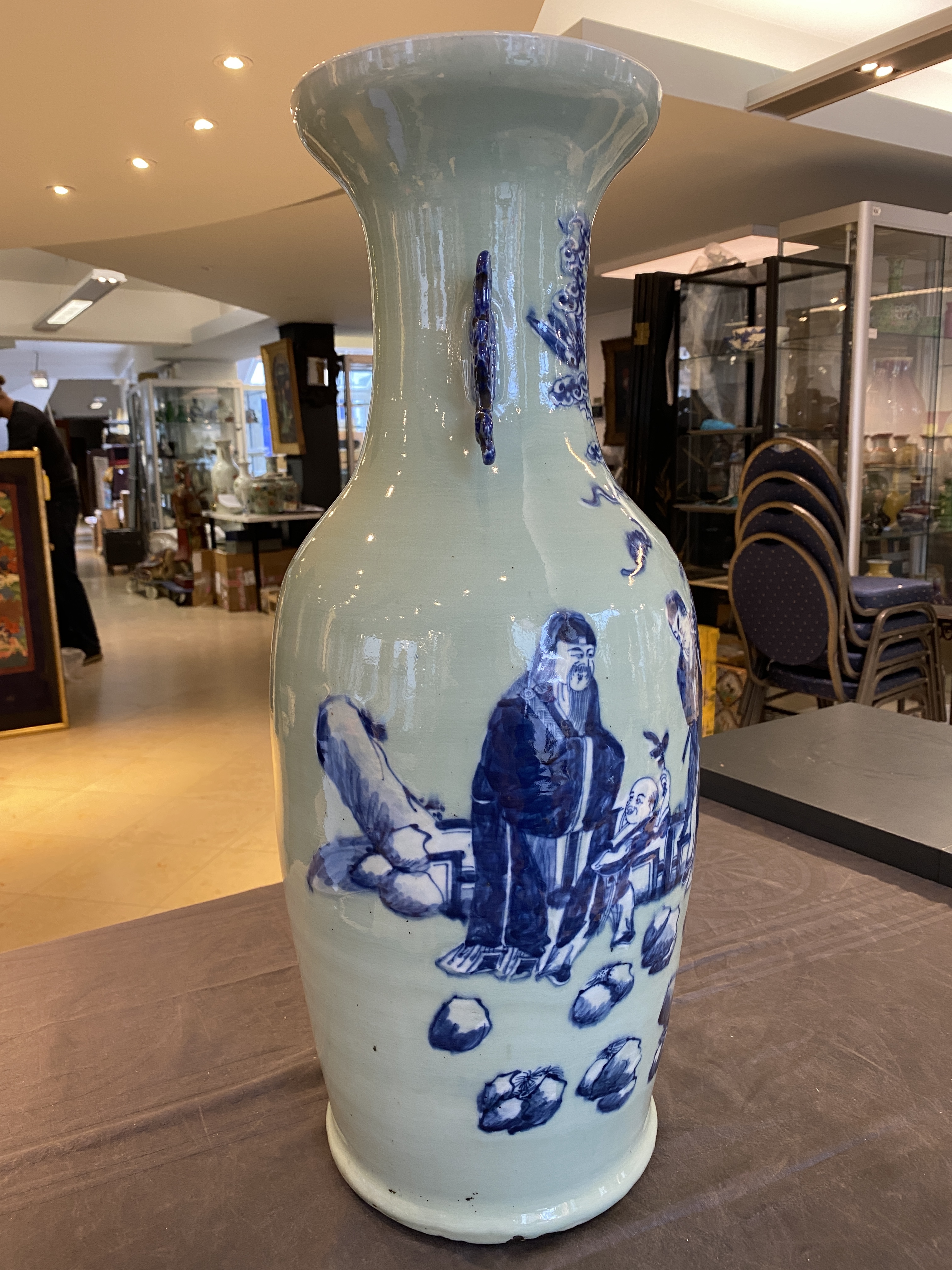 A Chinese blue and white celadon-ground 'immortals' vase, 19th C. - Image 10 of 17