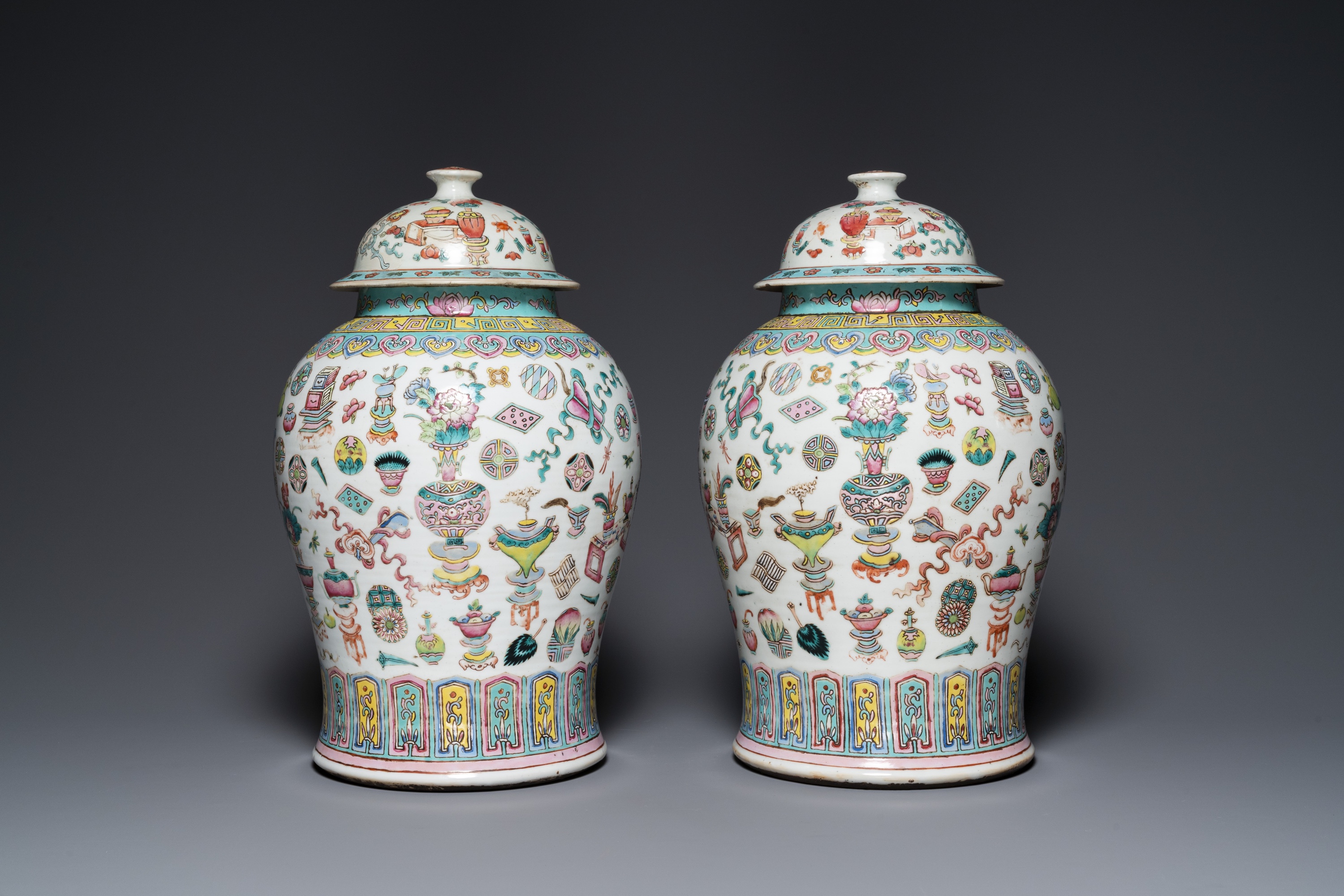 A pair of Chinese famille rose 'antiquities' vases and covers, 19th C. - Image 4 of 8