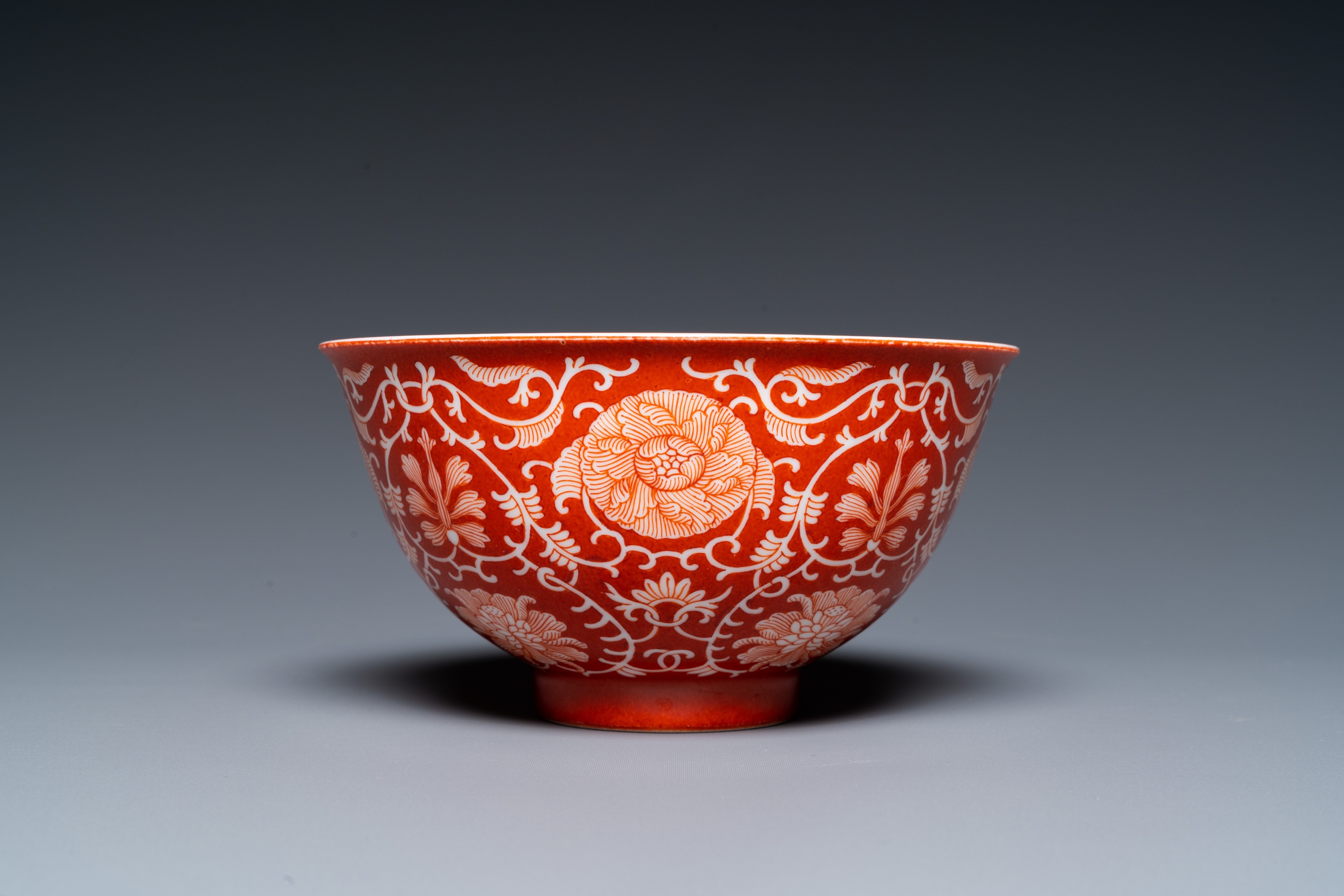 A Chinese coral-ground reserve-decorated 'lotus' bowl, Jiaqing mark, 19/20th C. - Image 5 of 18