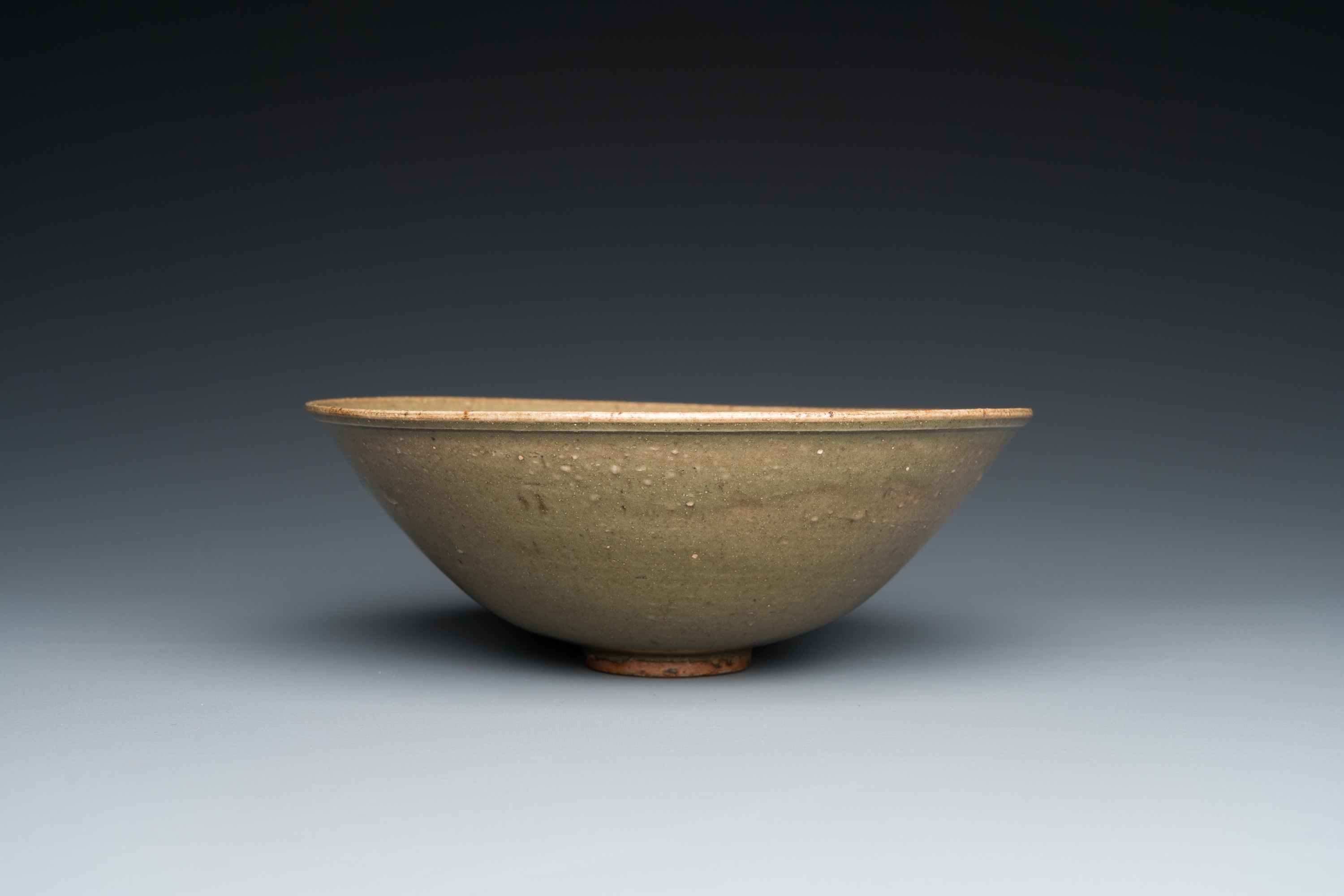 A Chinese Yaozhou celadon bowl with underglaze floral design, probably Ming - Image 4 of 7