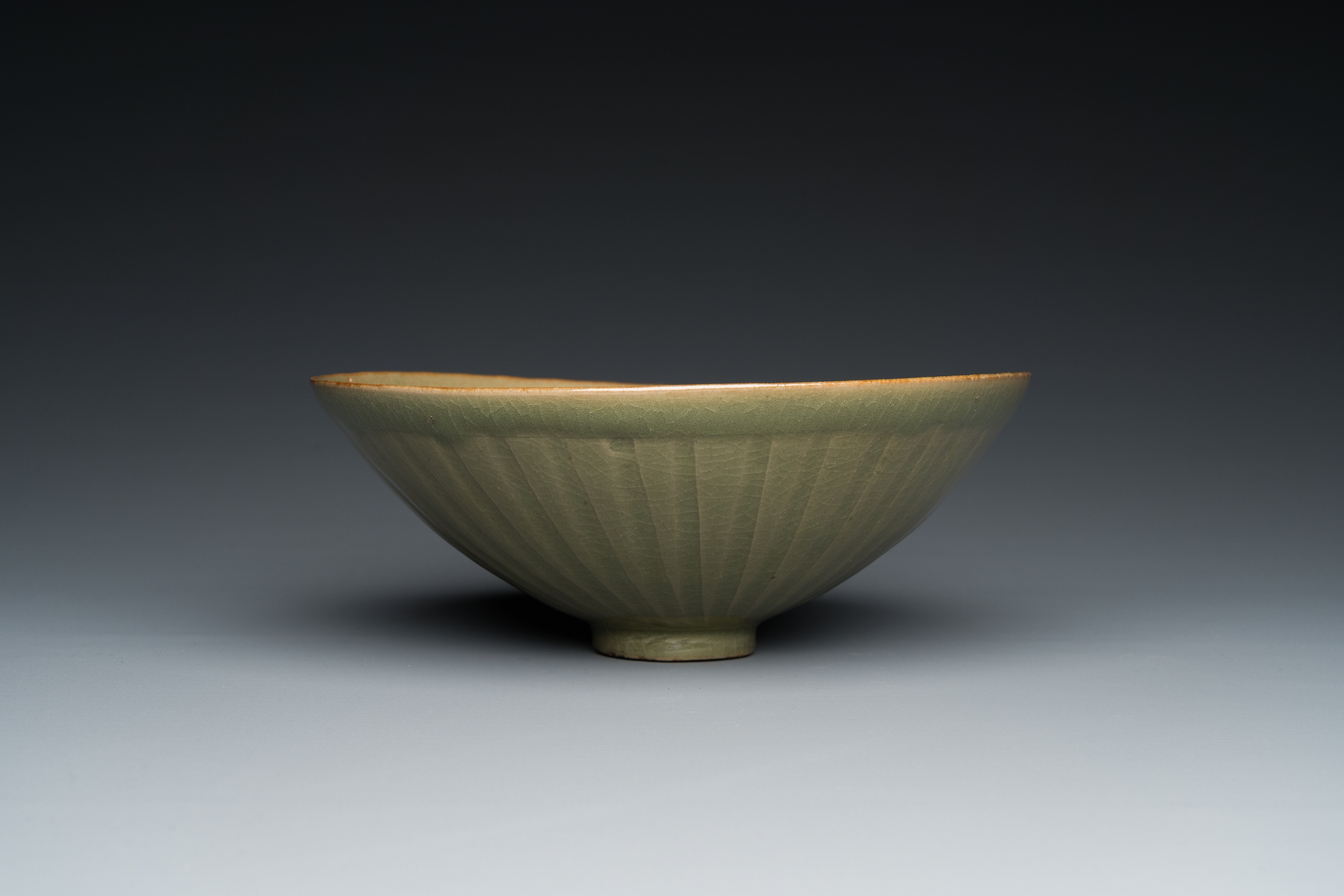 A Chinese Yaozhou celadon bowl with underglaze floral design, probably Song - Image 6 of 7