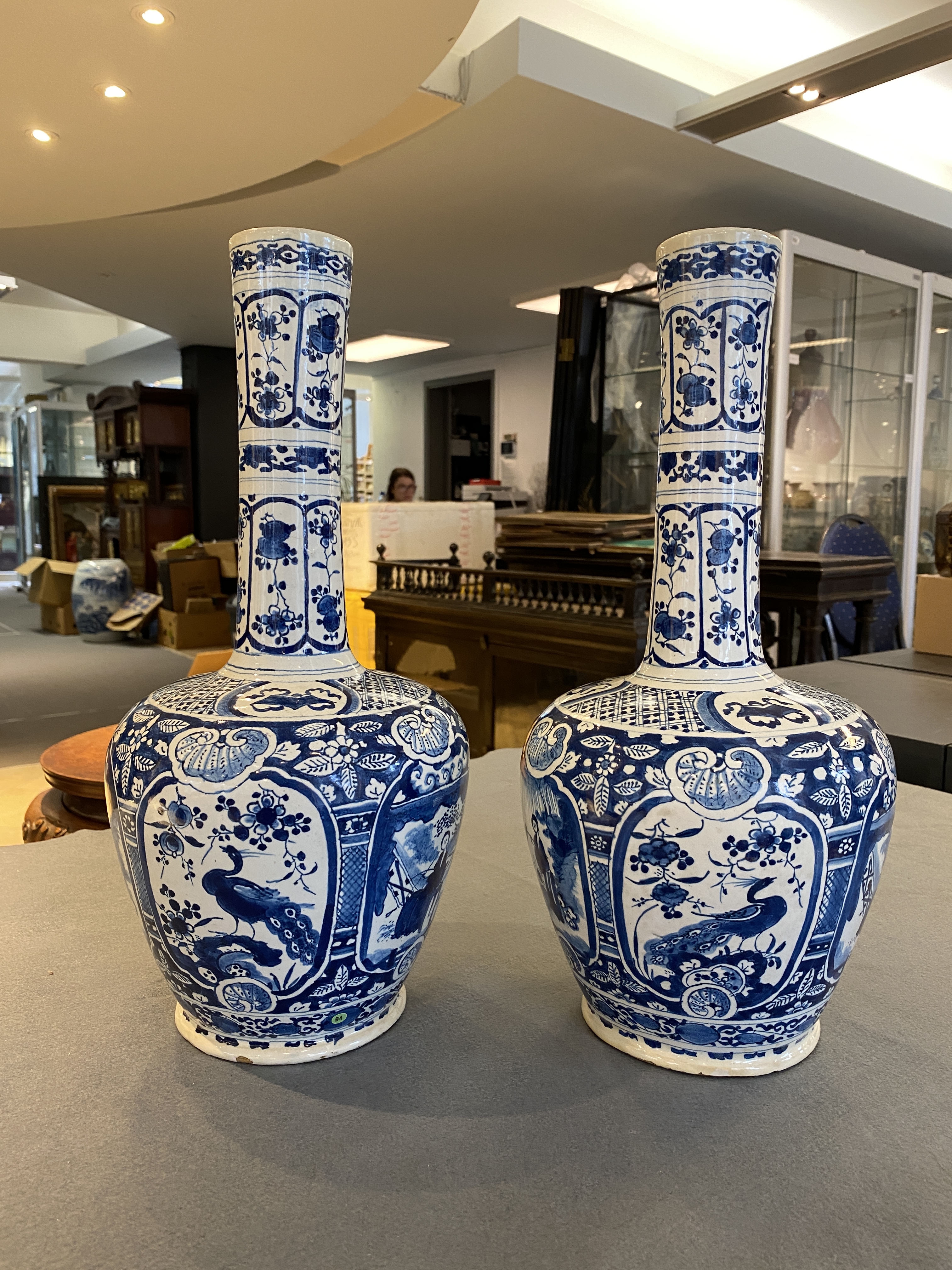A pair of Dutch Delft blue and white chinoiserie bottle vases, 18th C. - Image 8 of 33