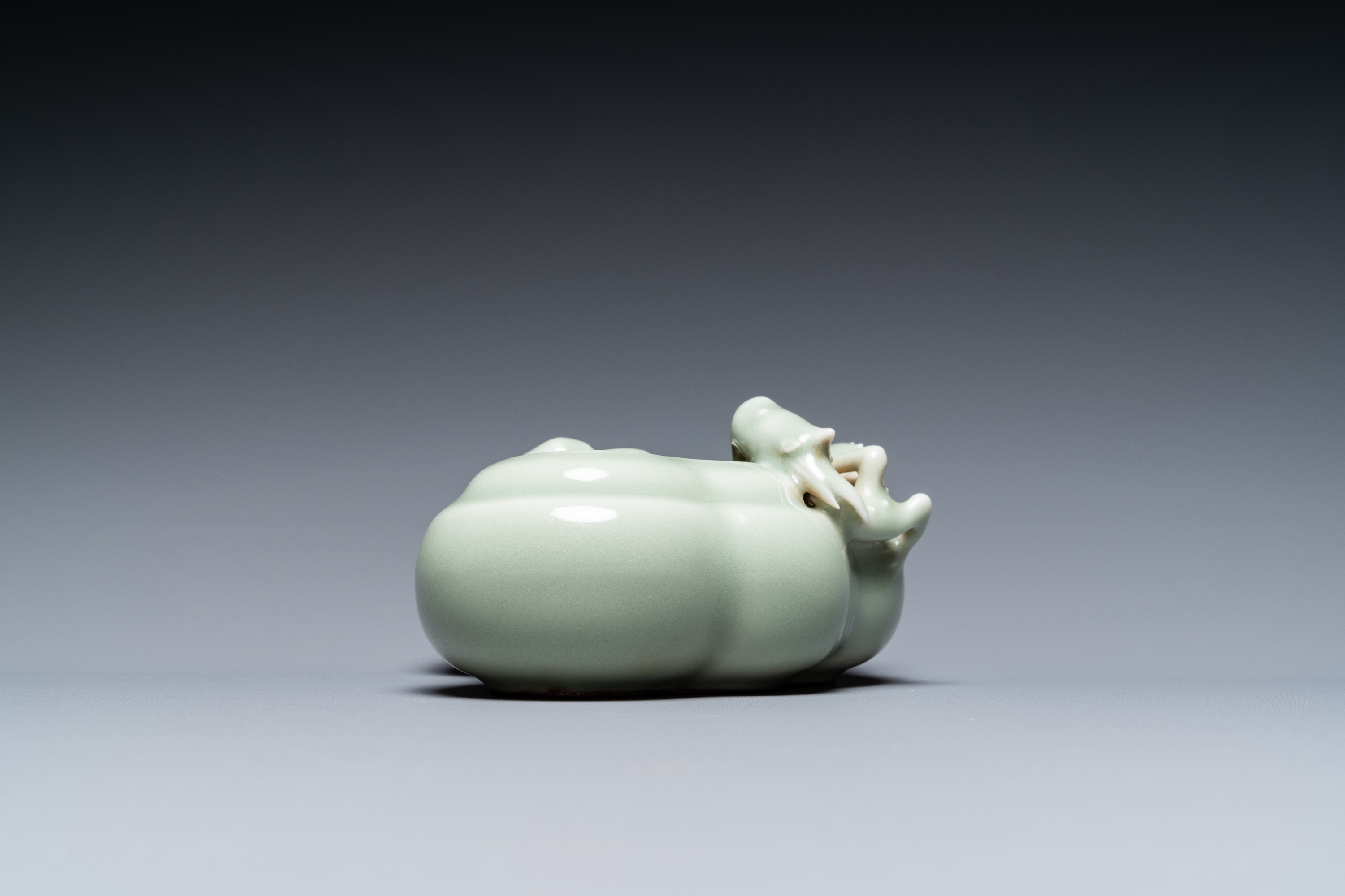 A Chinese celadon-glazed 'lingzhi' brush washer, Qianlong mark, 19/20th C. - Image 6 of 15