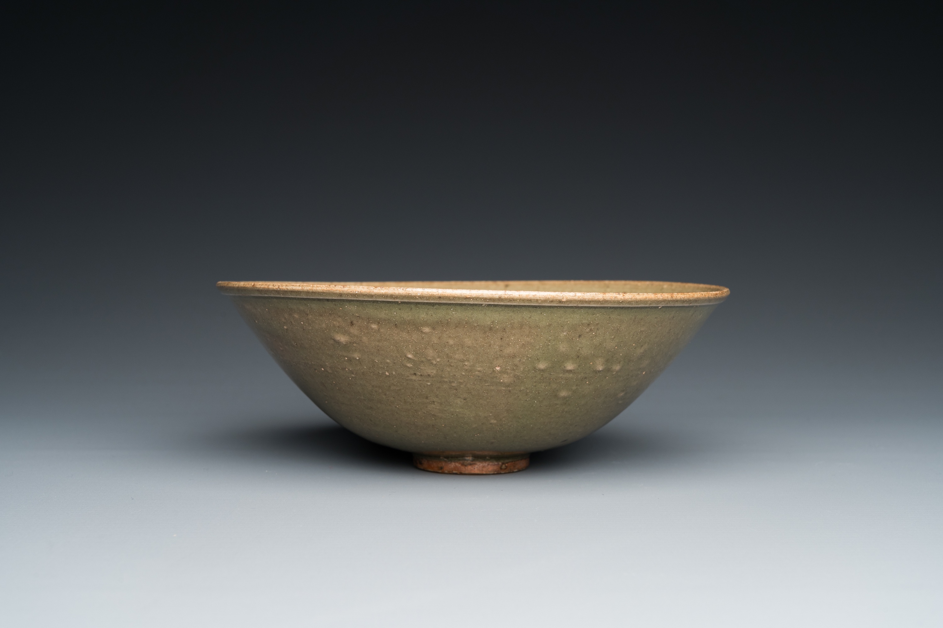 A Chinese Yaozhou celadon bowl with underglaze floral design, probably Ming - Image 5 of 7